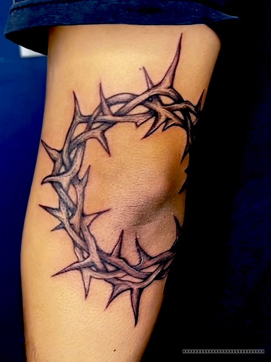 Tattoo on the elbow by Skar at Platinum Tattoos & Piercings, San Antonio TX
