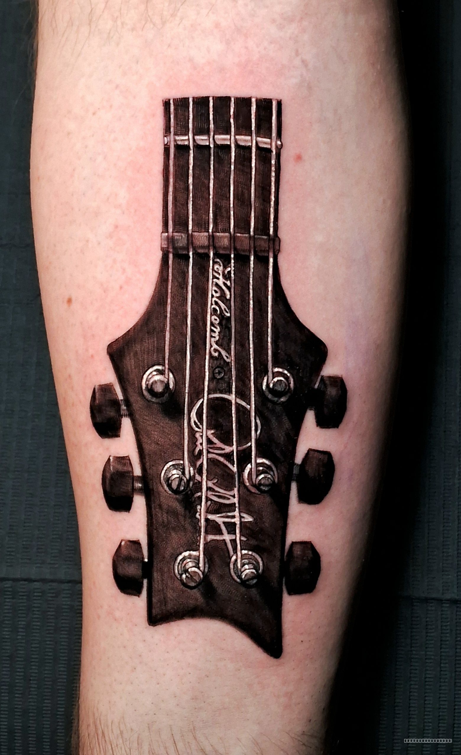 Black & Grey Black tattoo on the Upper Arm by Lee at Platinum Tattoos & Piercings, San Antonio TX