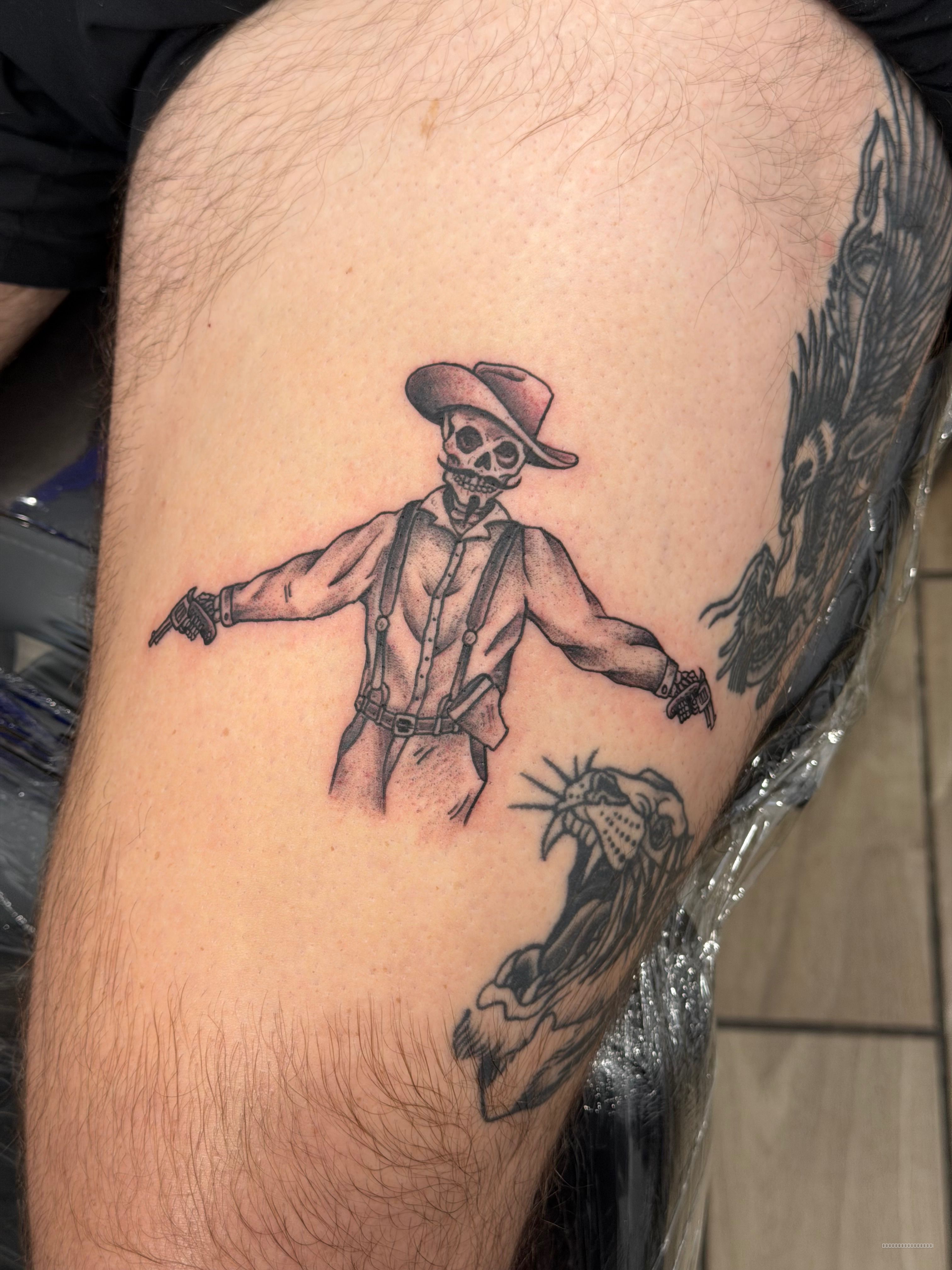 Black & Grey Black Cowboy tattoo by Jerson at Platinum Tattoos & Piercings, San Antonio TX
