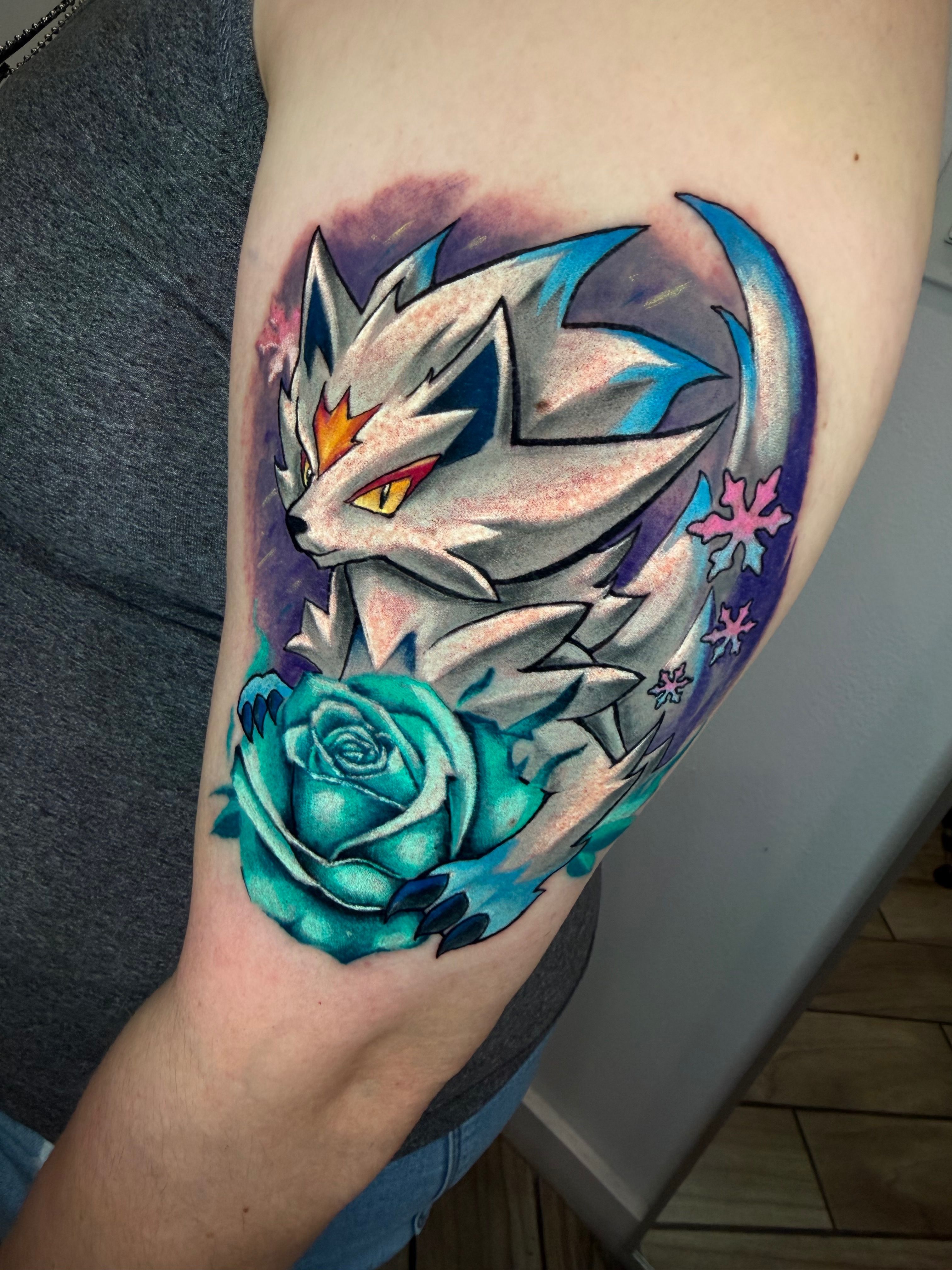 Color Multi-Color Rose, Wolf tattoo on the Tricep by Jerson at Platinum Tattoos & Piercings, San Antonio TX