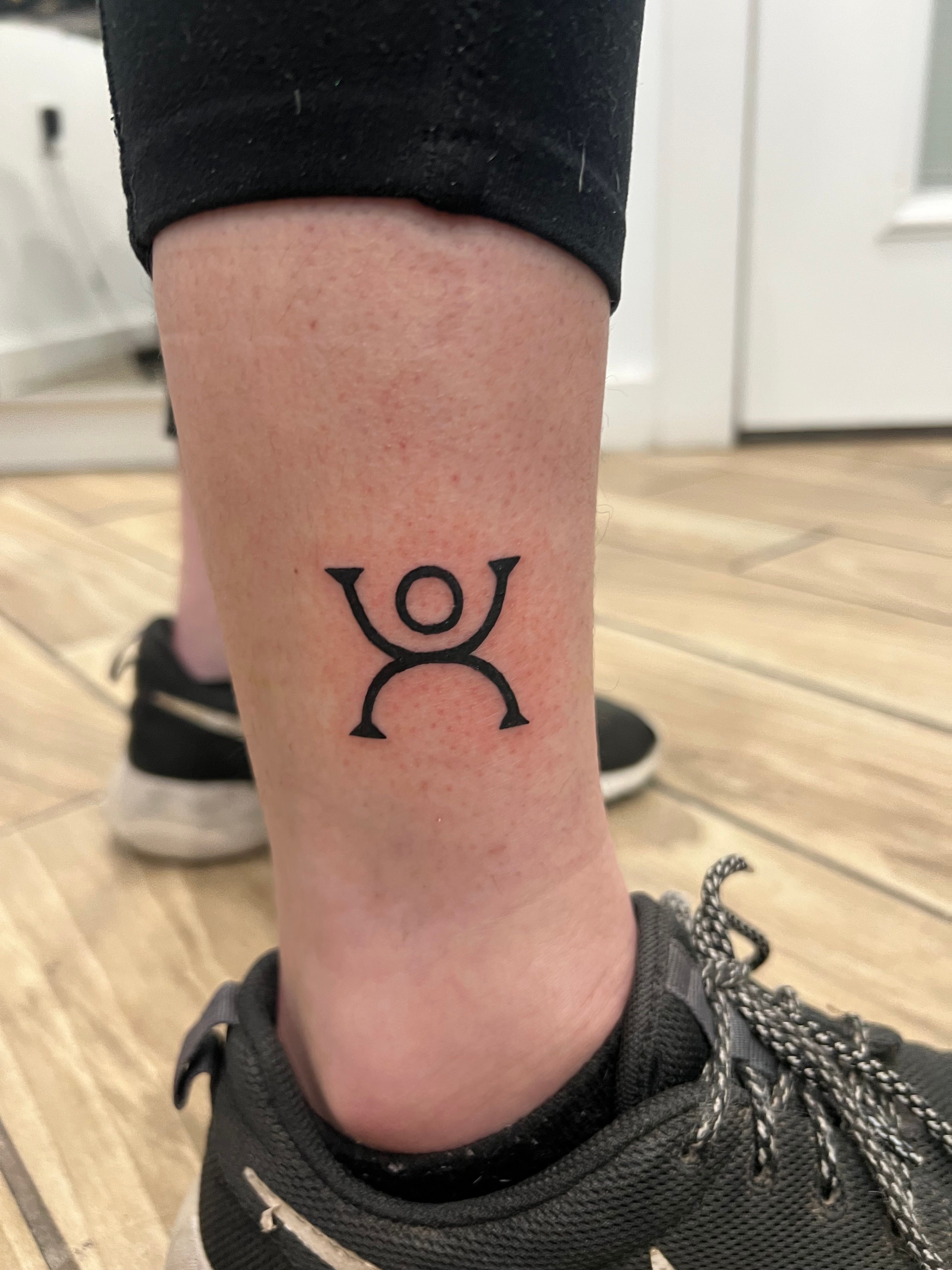 Floral & Tribal tattoo on the ankle by Jesus at Platinum Tattoos Piercings, San Antonio TX