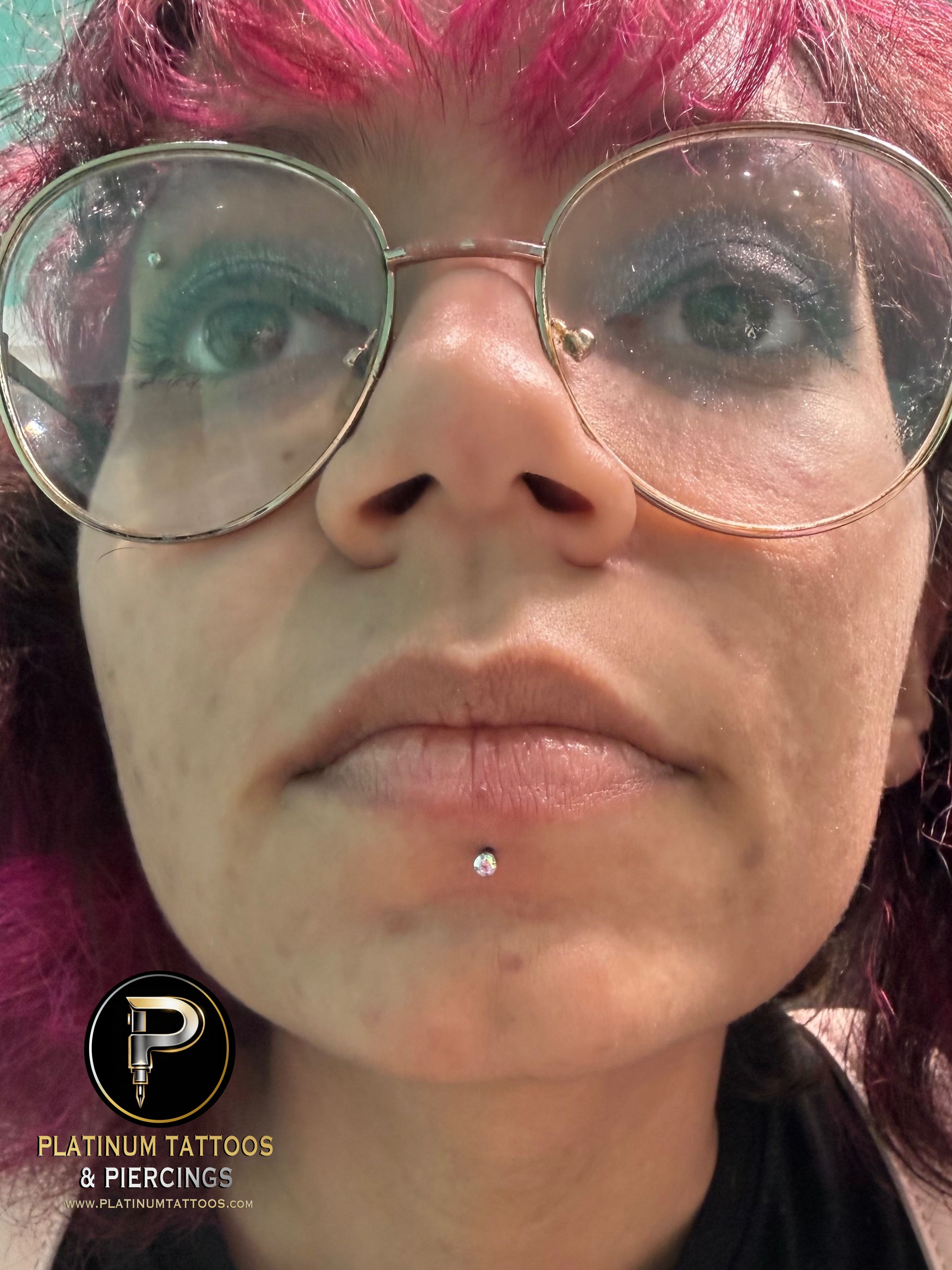 Labret piercing with Implant Grade Titanium Threadless by NeoMetal by Mingo at Platinum Tattoos & Piercings, San Antonio TX