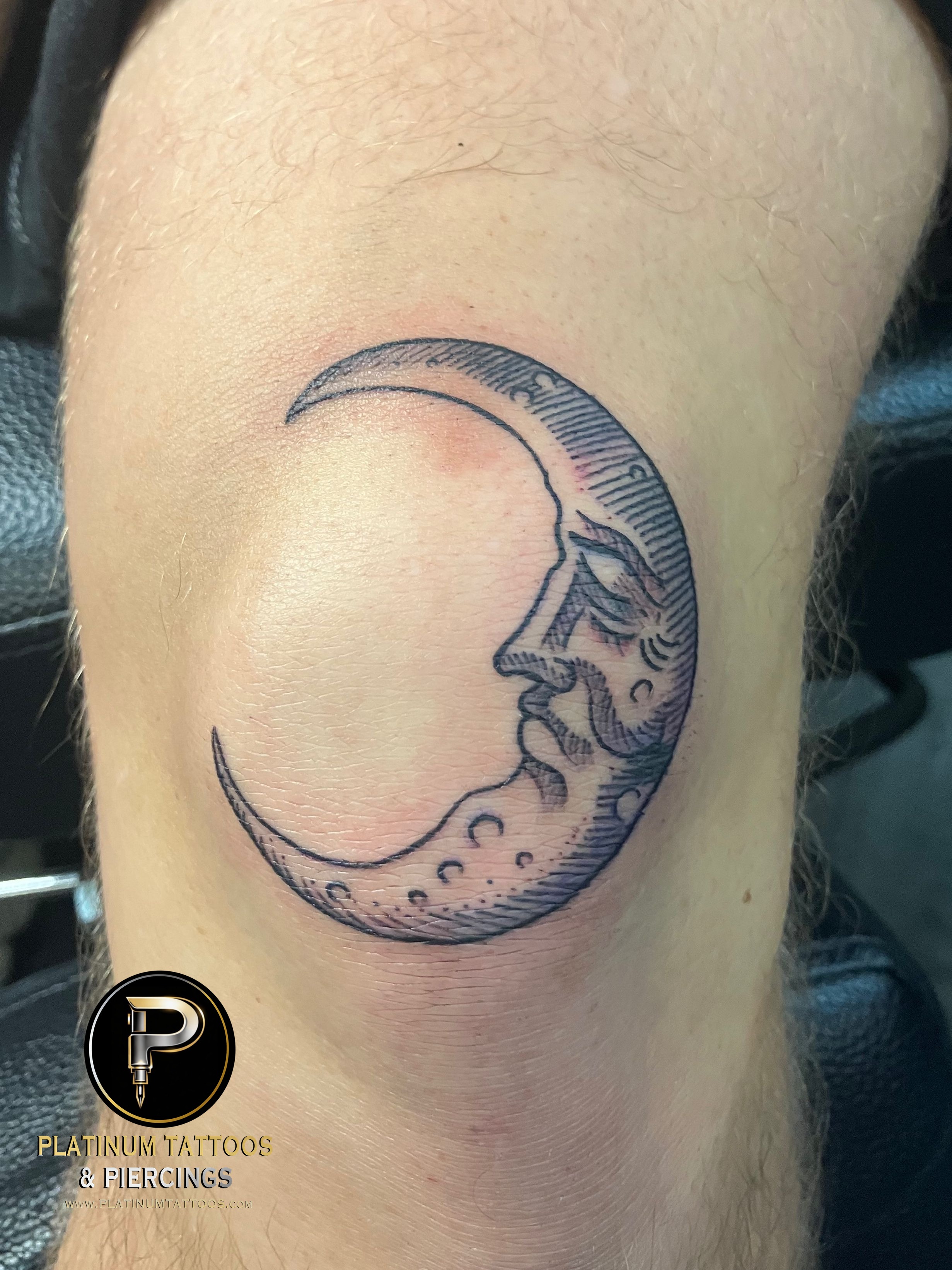 Blackwork, Traditional Black Moon tattoo on the Knee by Jr at Platinum Tattoos & Piercings, San Antonio TX