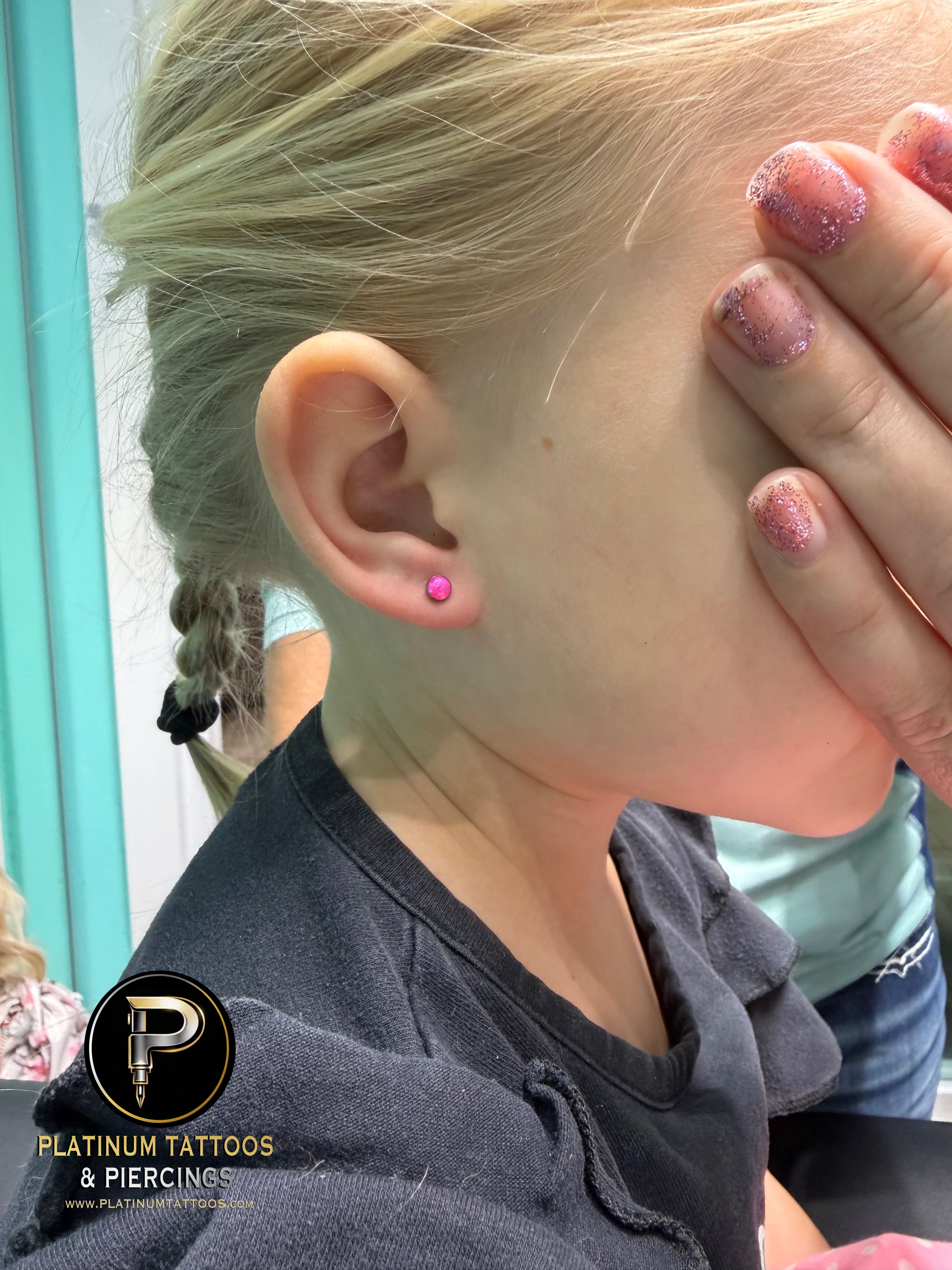 1st Lobe piercing with Implant Grade Titanium Labret Stud/Flat Back by NeoMetal by Mingo at Platinum Tattoos & Piercings, San Antonio TX