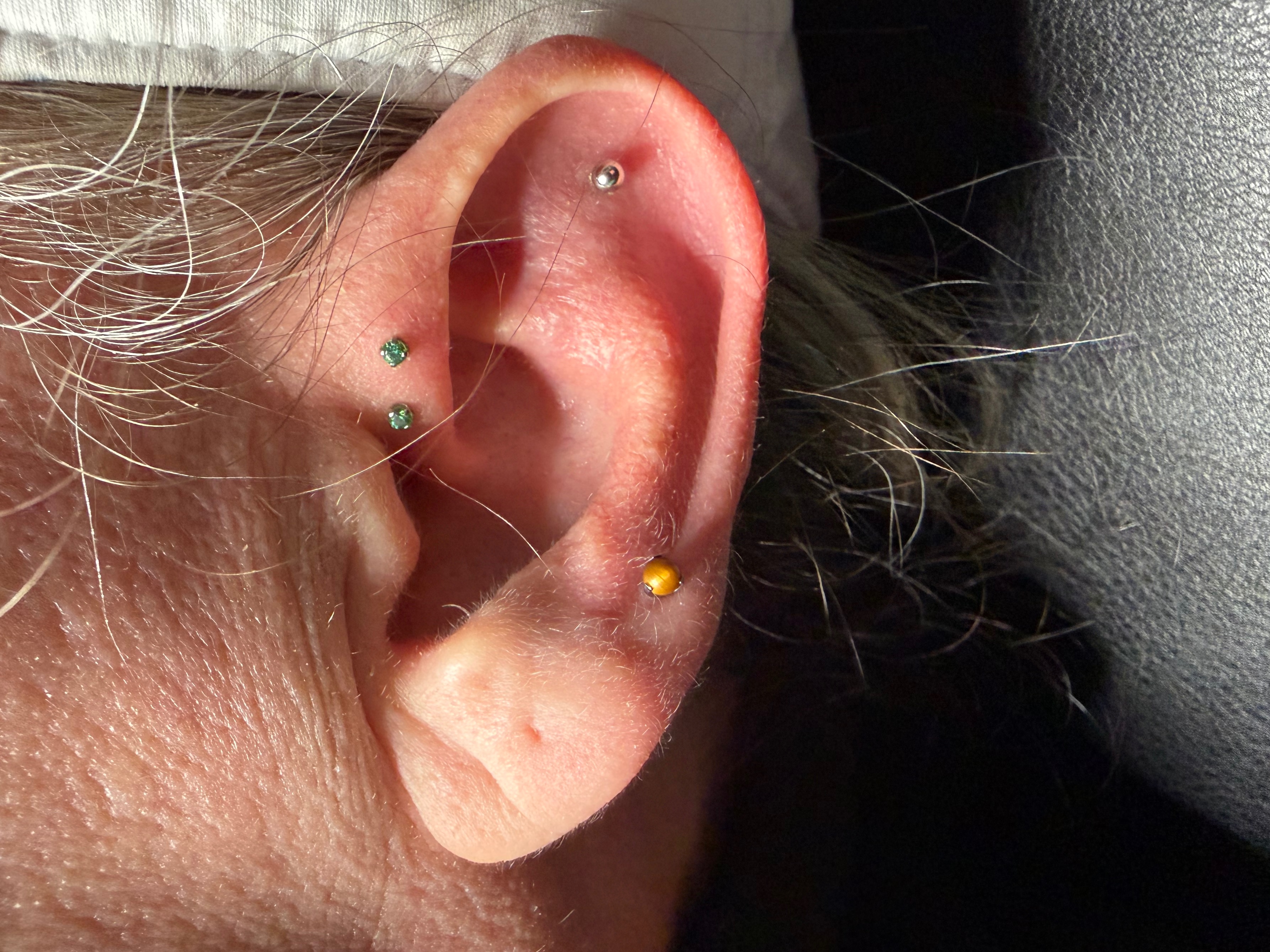 Mid Helix piercing with Implant Grade Titanium Labret Stud/Flat Back by NeoMetal by Mingo at Platinum Tattoos & Piercings, San Antonio TX