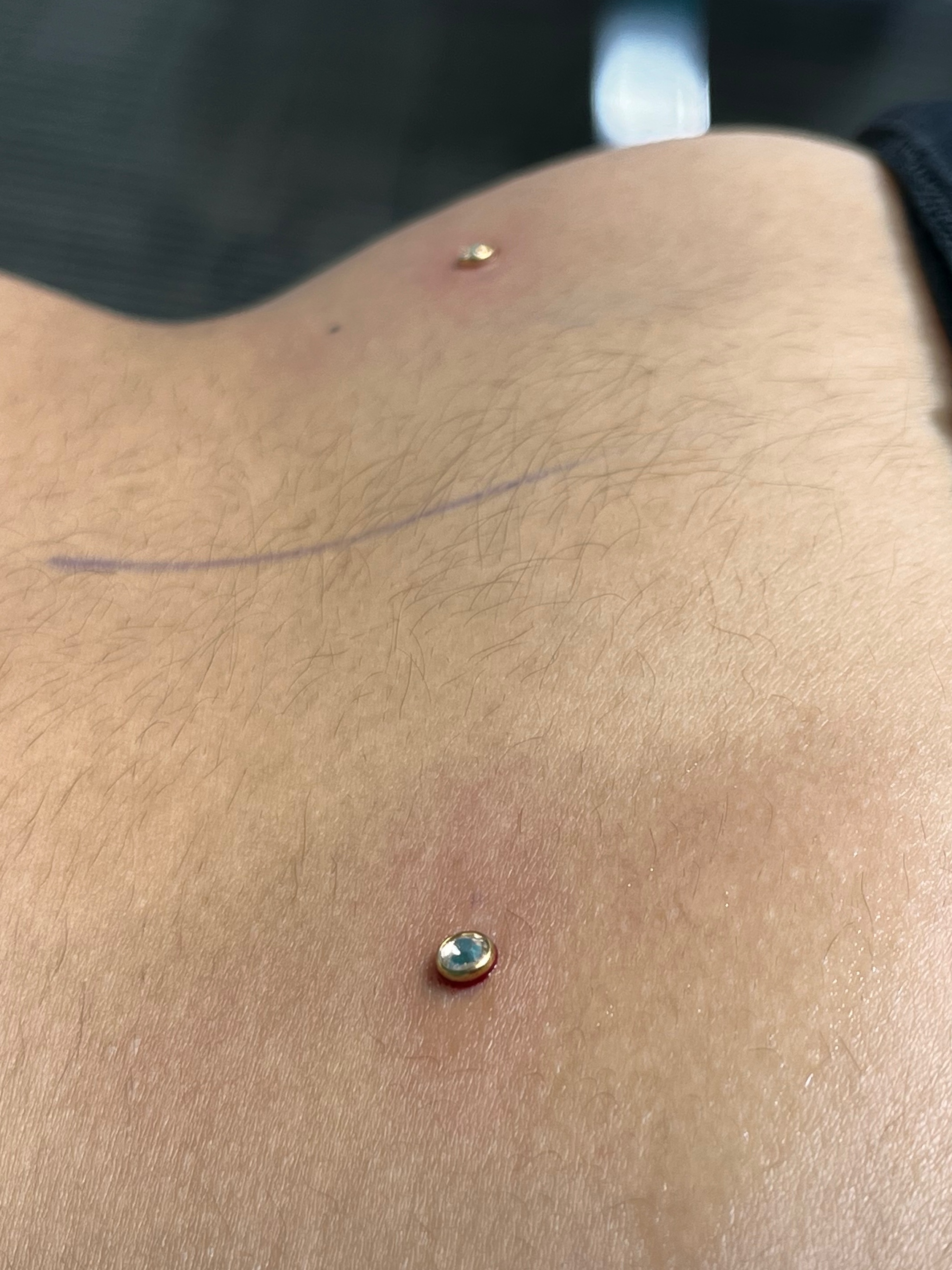 Dermal piercing with Implant Grade Titanium Surface Jewelry by Other by Harley at Platinum Tattoos & Piercings, San Antonio TX