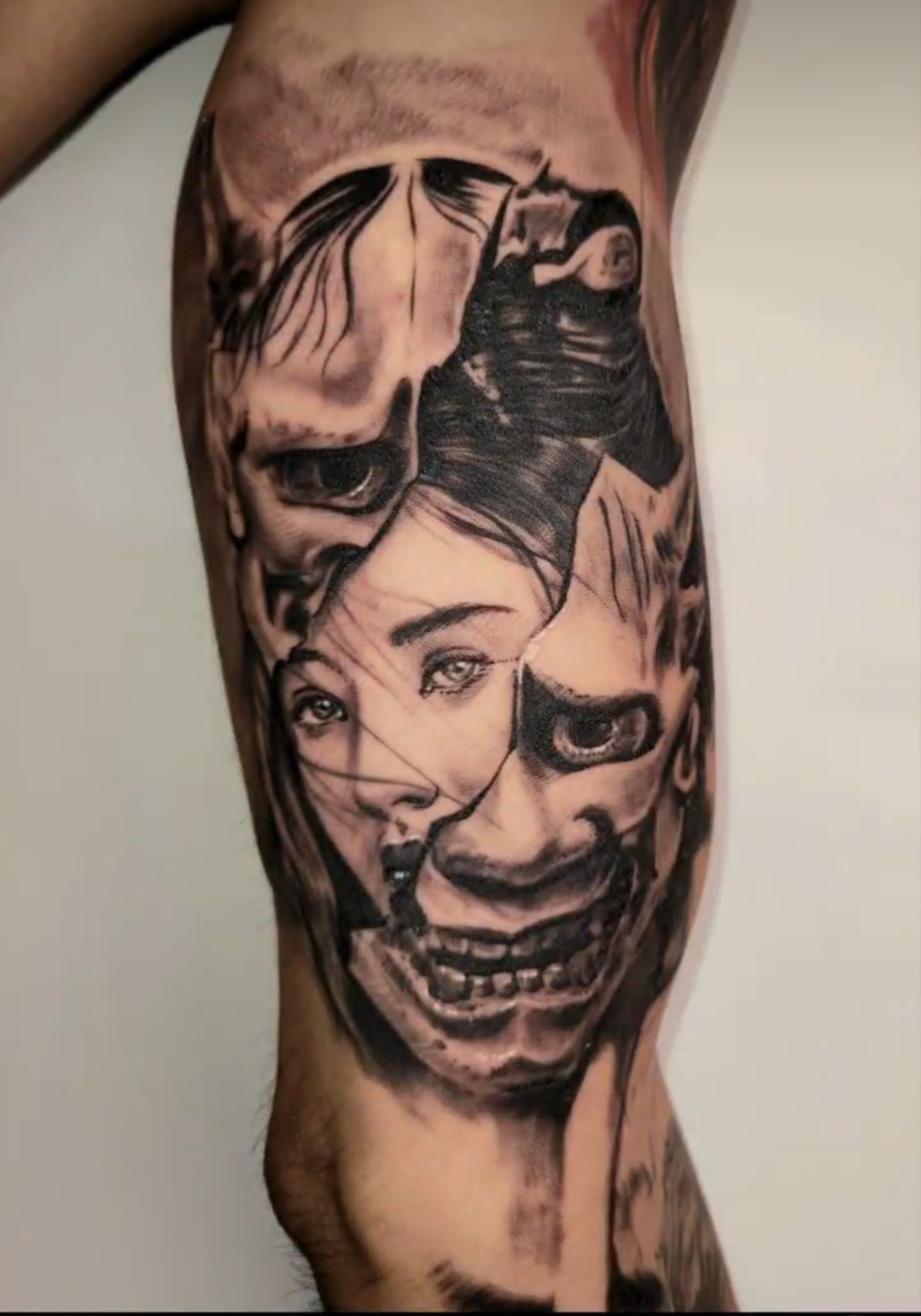 Black & Grey tattoo on the Upper Arm by Lee at Platinum Tattoos & Piercings, San Antonio TX