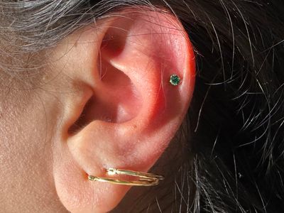1st Helix piercing with Implant Grade Titanium Threadless by NeoMetal by Mingo at Platinum Tattoos & Piercings, San Antonio TX