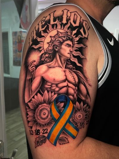 Black & Grey Black, Yellow, Blue tattoo on the Upper Arm by Skar at Platinum Tattoos & Piercings, San Antonio TX