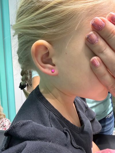 1st Lobe piercing with Implant Grade Titanium Labret Stud/Flat Back by NeoMetal by Mingo at Platinum Tattoos & Piercings, San Antonio TX