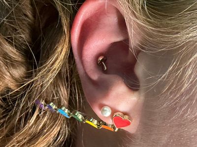 Conch piercing with 14k Yellow Gold Threadless by Mingo at Platinum Tattoos & Piercings, San Antonio TX