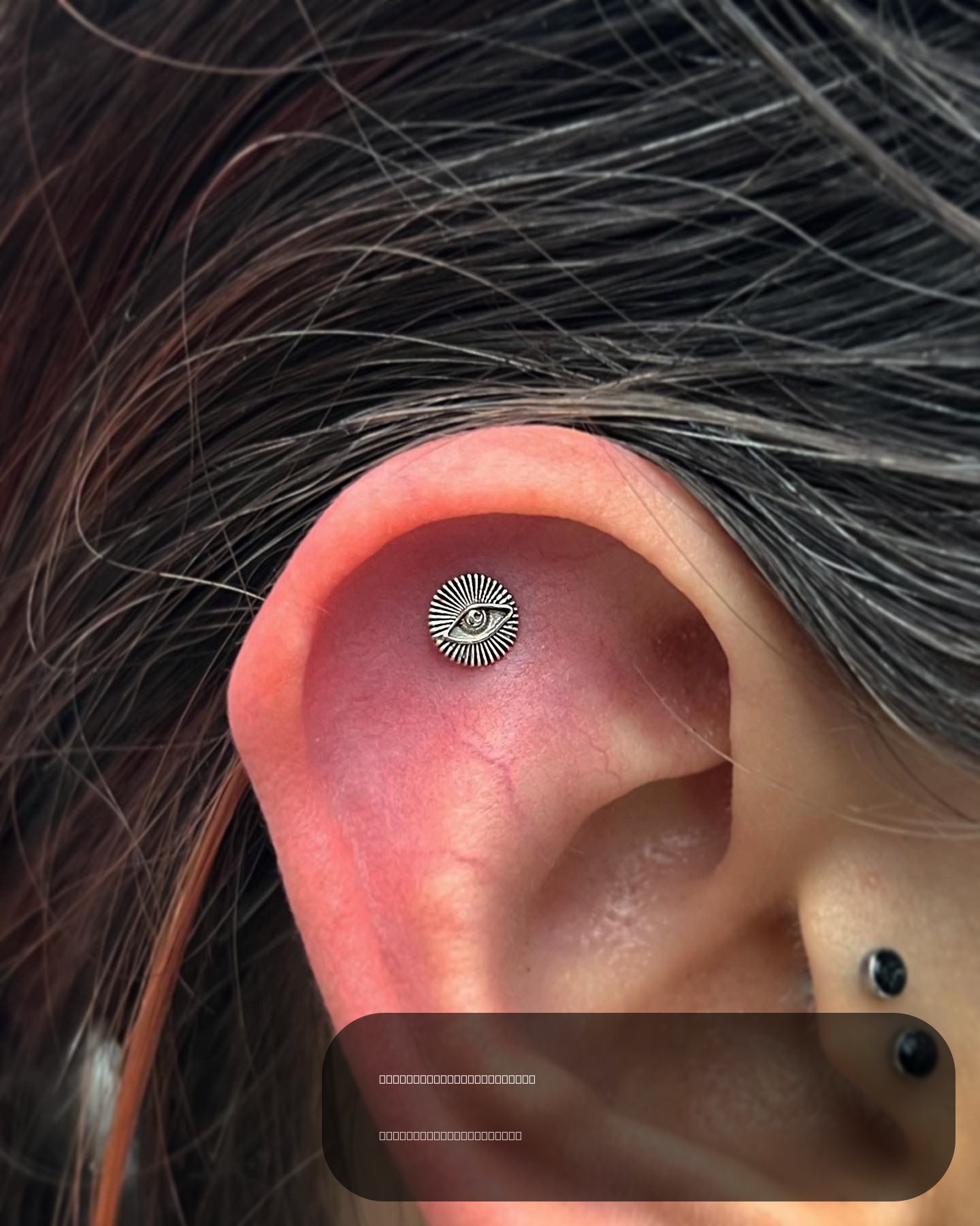 Flat piercing with 14k White Gold Threadless by Tawapa by JC at Platinum Tattoos & Piercings, San Antonio TX