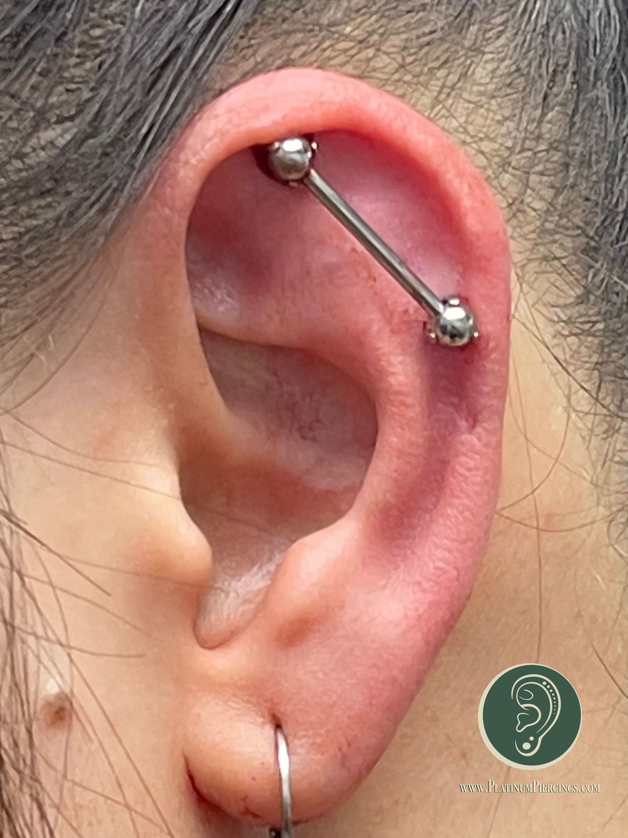 Industrial piercing with Implant Grade Titanium Threadless by NeoMetal by Crystal at Platinum Body Piercings, San Antonio TX
