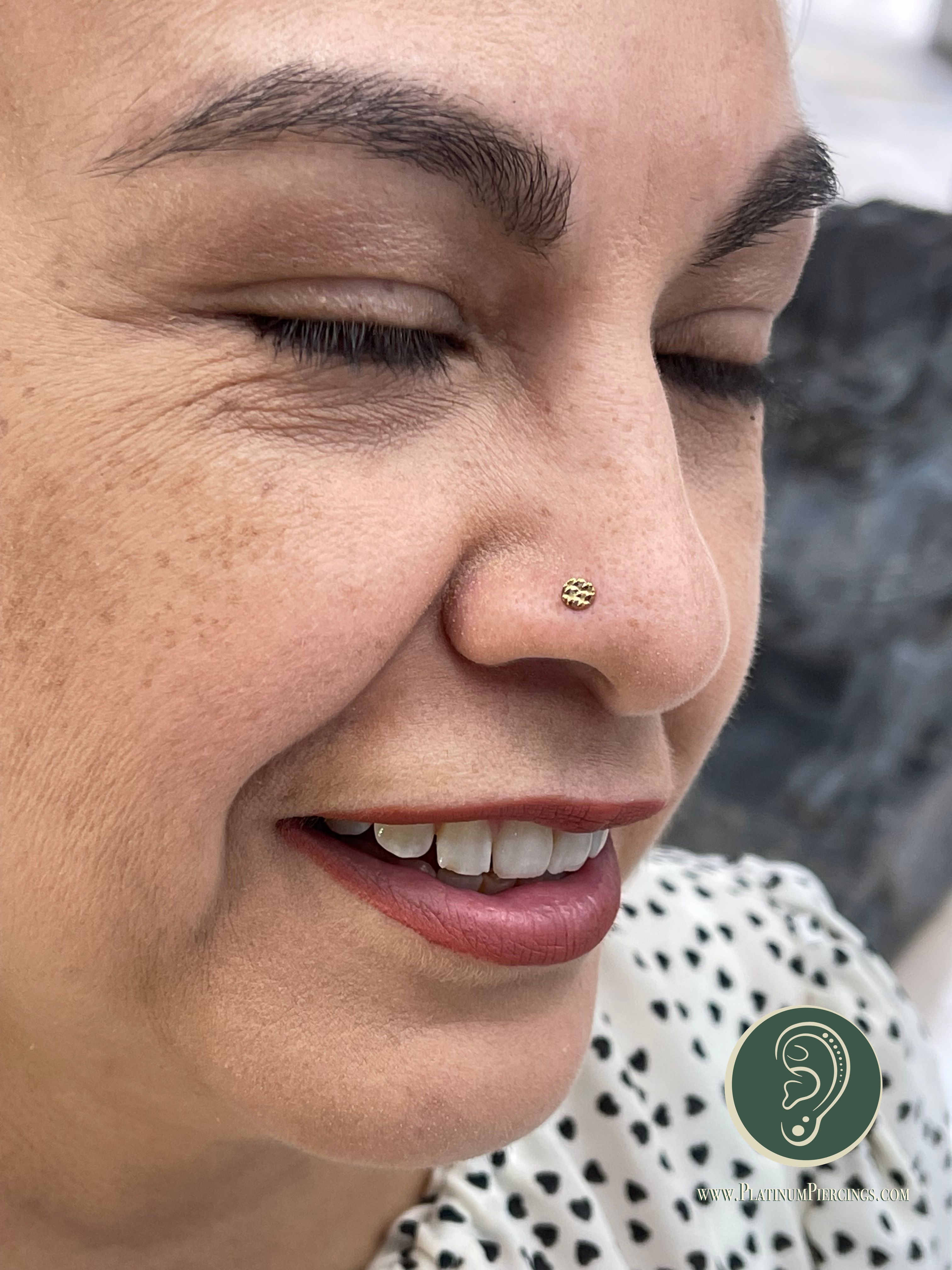 Double Nostril piercing with Implant Grade Titanium Threadless by NeoMetal by Crystal at Platinum Body Piercings, San Antonio TX