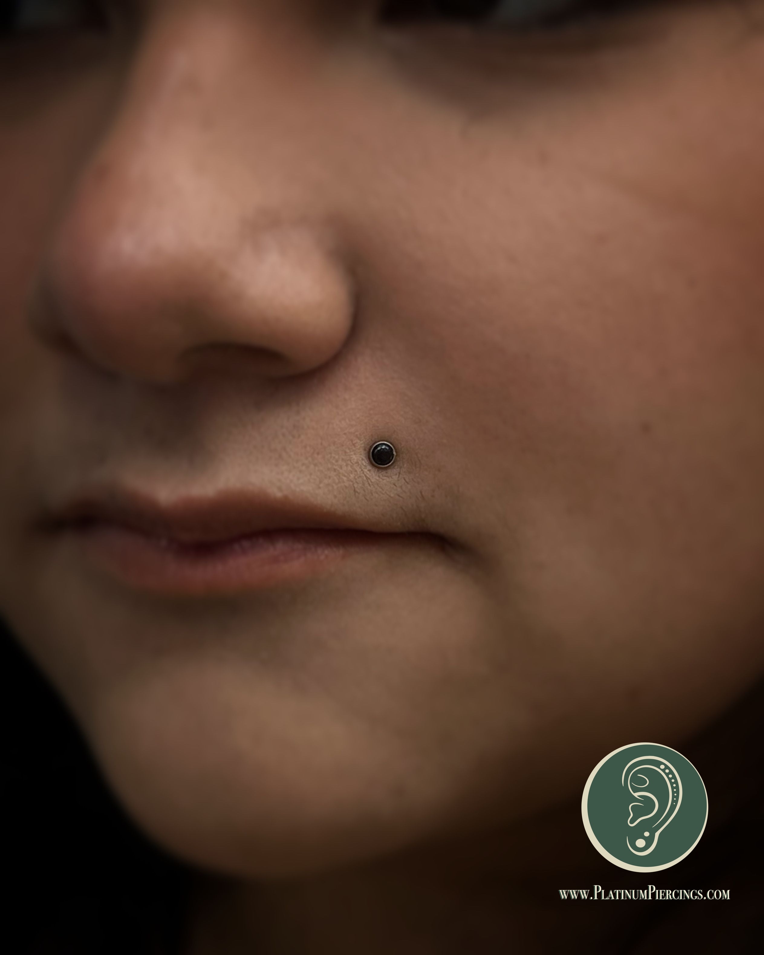 Monroe piercing with Implant Grade Titanium Threadless by NeoMetal by JC at Platinum Body Piercings, San Antonio TX