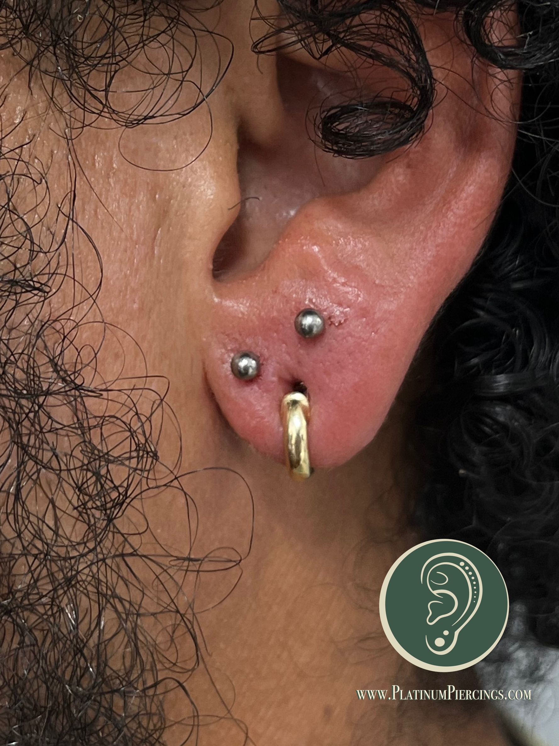 Stacked Lobe piercing with Implant Grade Titanium Threadless by NeoMetal by Harley at Platinum Body Piercings, San Antonio TX