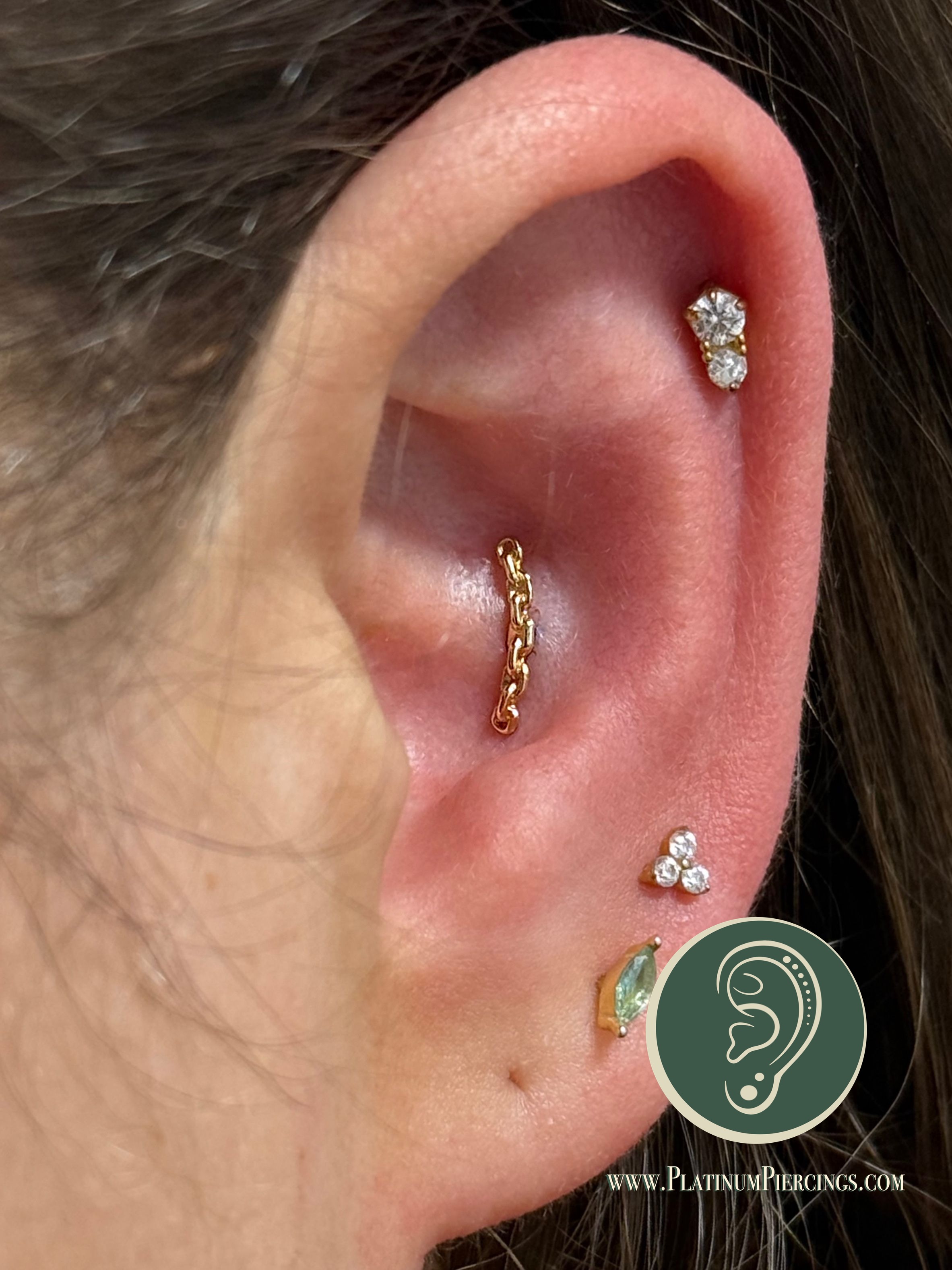 Conch piercing with 14k Yellow Gold Labret Stud/Flat Back by Tawapa by Crystal at Platinum Body Piercings, San Antonio TX