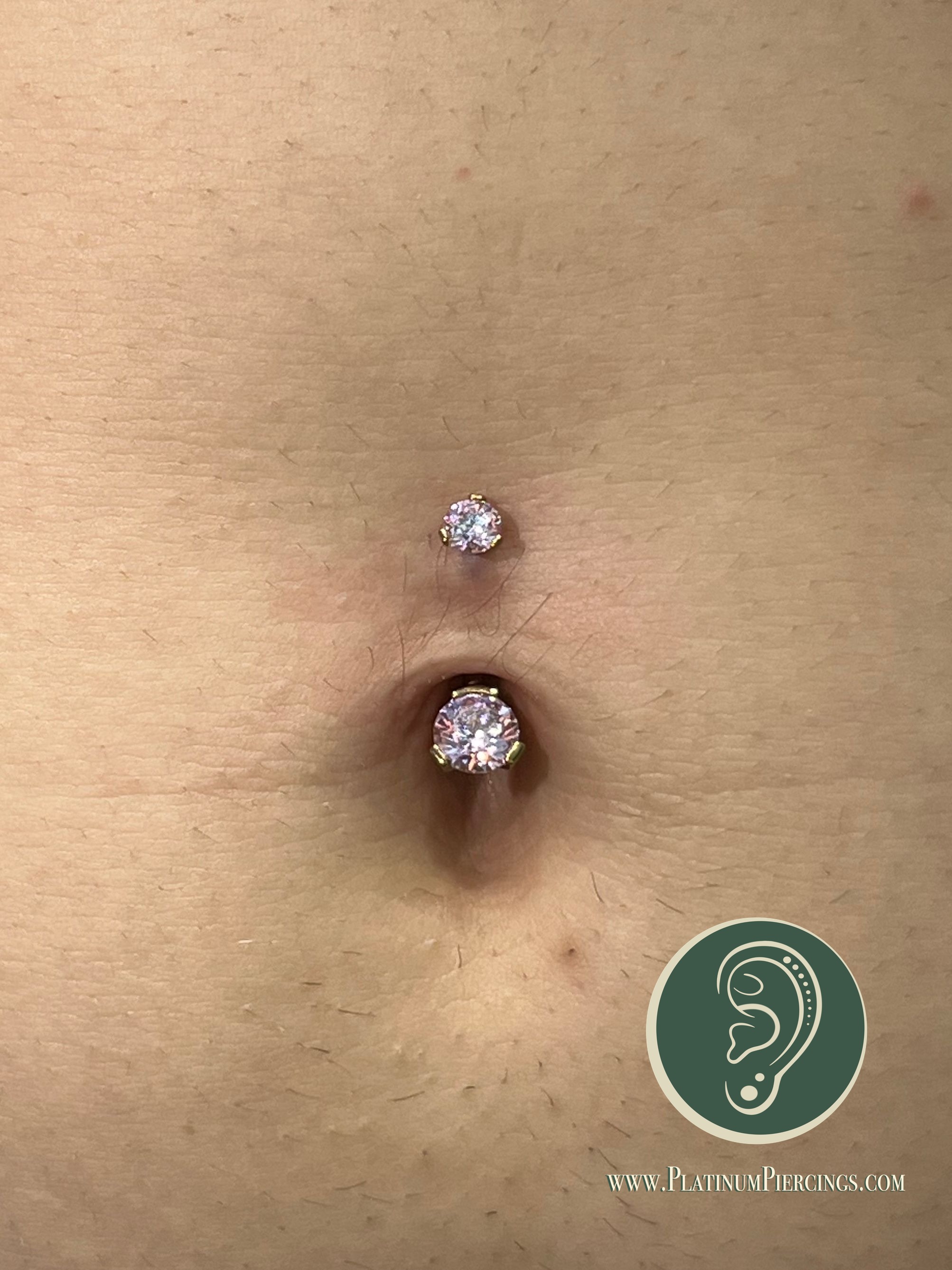 Belly Button piercing with Implant Grade Titanium Curved Barbell by Industrial Strength by Harley at Platinum Body Piercings, San Antonio TX