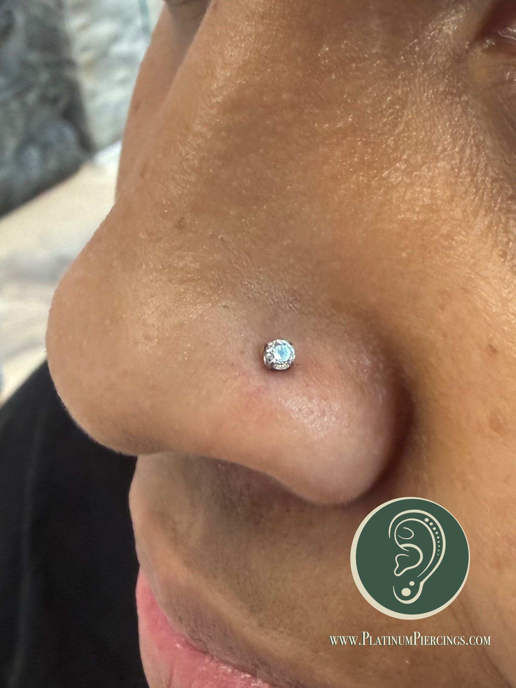 Nostril piercing with Implant Grade Titanium Labret Stud/Flat Back by NeoMetal by Crystal at Platinum Body Piercings, San Antonio TX