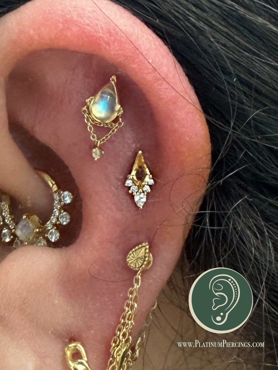3rd Helix piercing with 14k Yellow Gold Labret Stud/Flat Back by Buddha Jewelry by Crystal at Platinum Body Piercings, San Antonio TX