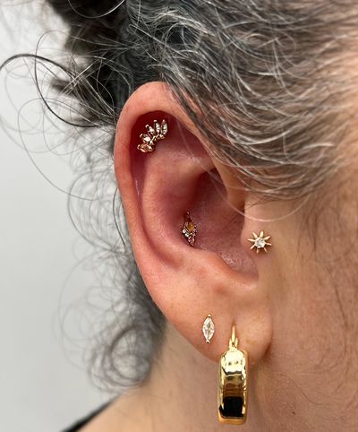 body piercing with 14k Yellow Gold Threadless by Buddha Jewelry by JC at Platinum Tattoos & Piercings, San Antonio TX