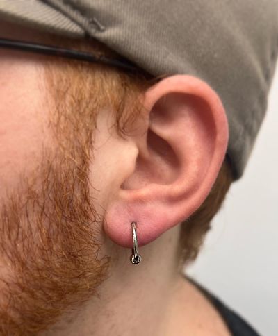 body piercing with Captive Bead Ring by JC at Platinum Tattoos & Piercings, San Antonio TX