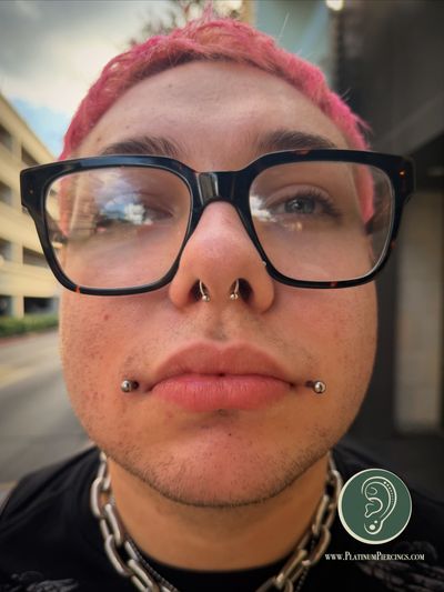 piercing Labret on the Cheek by Jaycee