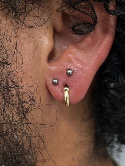 Stacked Lobe piercing with Implant Grade Titanium Threadless by NeoMetal by Harley at Platinum Body Piercings, San Antonio TX