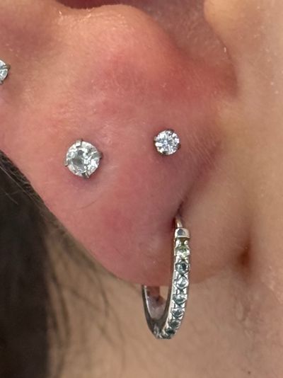 Stacked Lobe piercing with Implant Grade Titanium Labret Stud/Flat Back by NeoMetal by Crystal at Platinum Body Piercings, San Antonio TX
