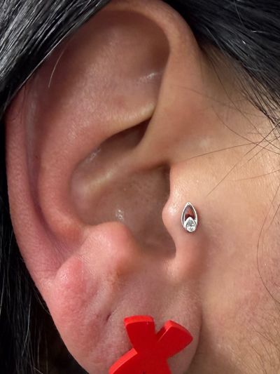 Tragus piercing with 14k White Gold Labret Stud/Flat Back by Tawapa by Crystal at Platinum Body Piercings, San Antonio TX