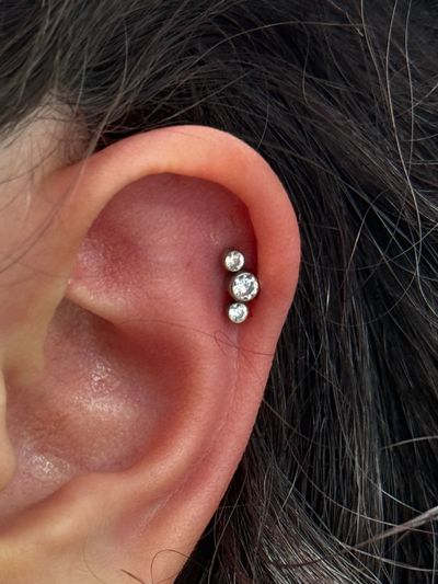 1st Helix piercing with Implant Grade Titanium Labret Stud/Flat Back by NeoMetal by Crystal at Platinum Body Piercings, San Antonio TX