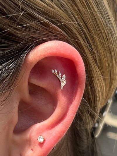 Flat piercing with 14k Yellow Gold Threadless by Buddha Jewelry by Harley at Platinum Body Piercings, San Antonio TX