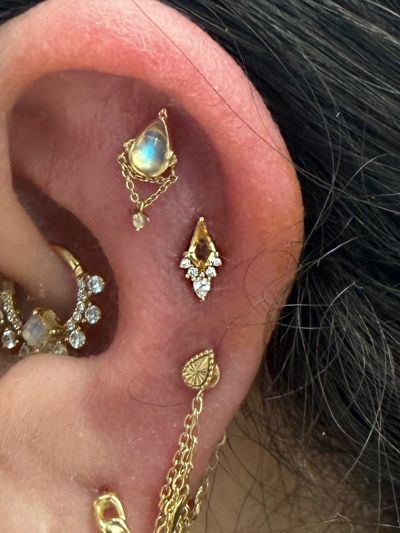 3rd Helix piercing with 14k Yellow Gold Labret Stud/Flat Back by Buddha Jewelry by Crystal at Platinum Body Piercings, San Antonio TX