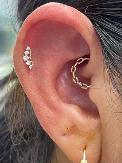 Daith piercing with 14k Yellow Gold Seamless Ring by Tawapa by Crystal at Platinum Body Piercings, San Antonio TX