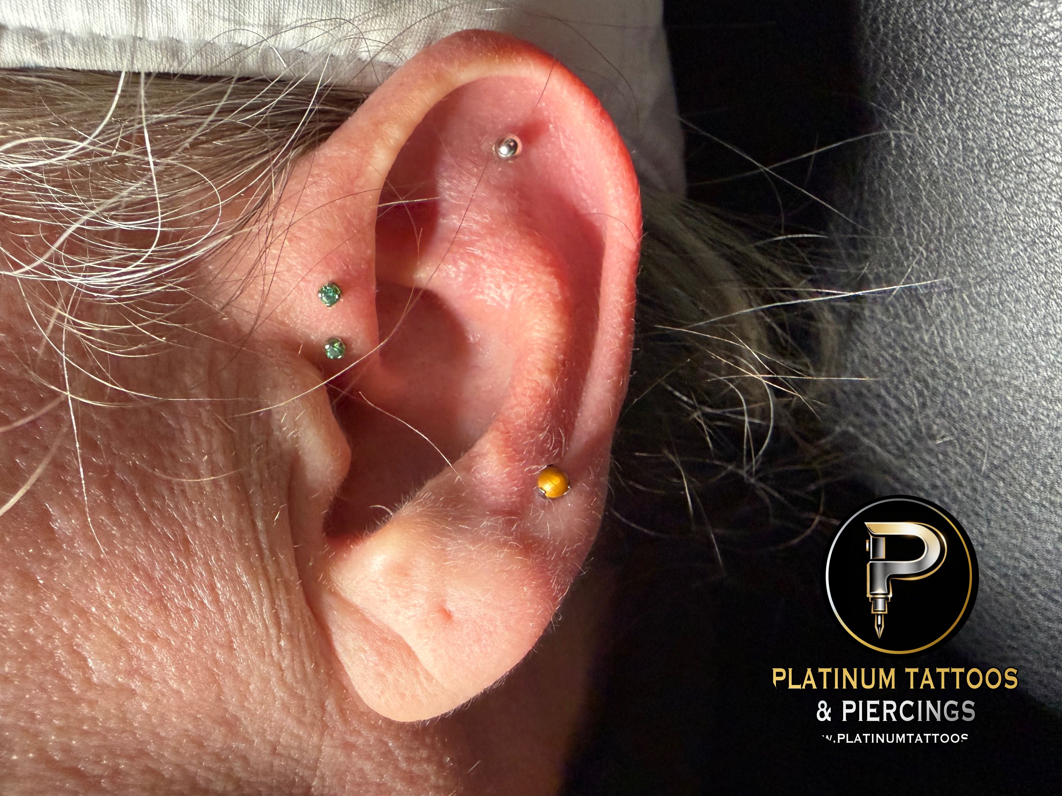 Mid Helix piercing with Implant Grade Titanium Labret Stud/Flat Back by NeoMetal by Mingo at Platinum Tattoos & Piercings, San Antonio TX