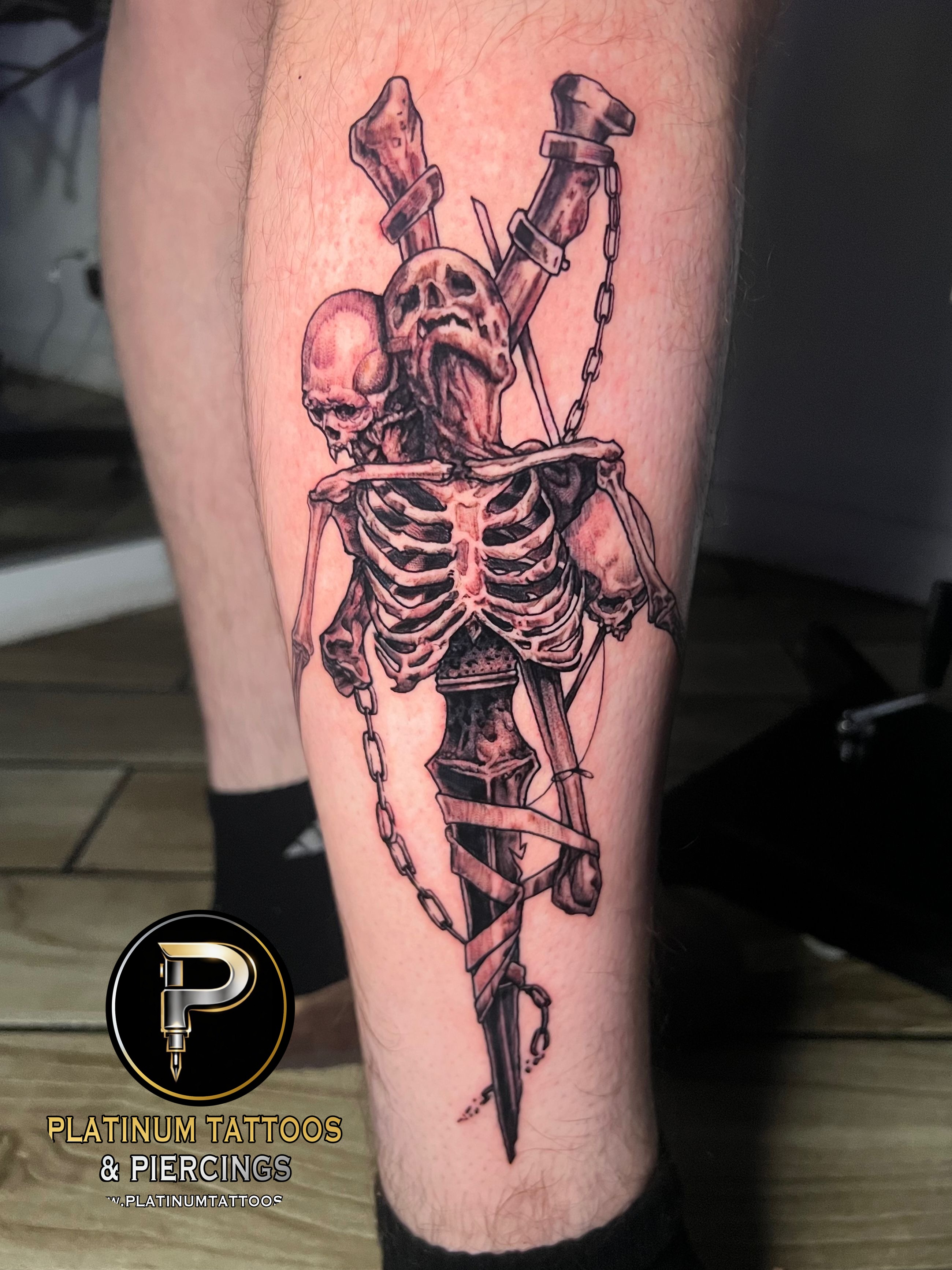 Black & Grey, Blackwork, Dark Art Black Cross, Dagger, Skull tattoo on the Ankle by Jesus at Platinum Tattoos & Piercings, San Antonio TX