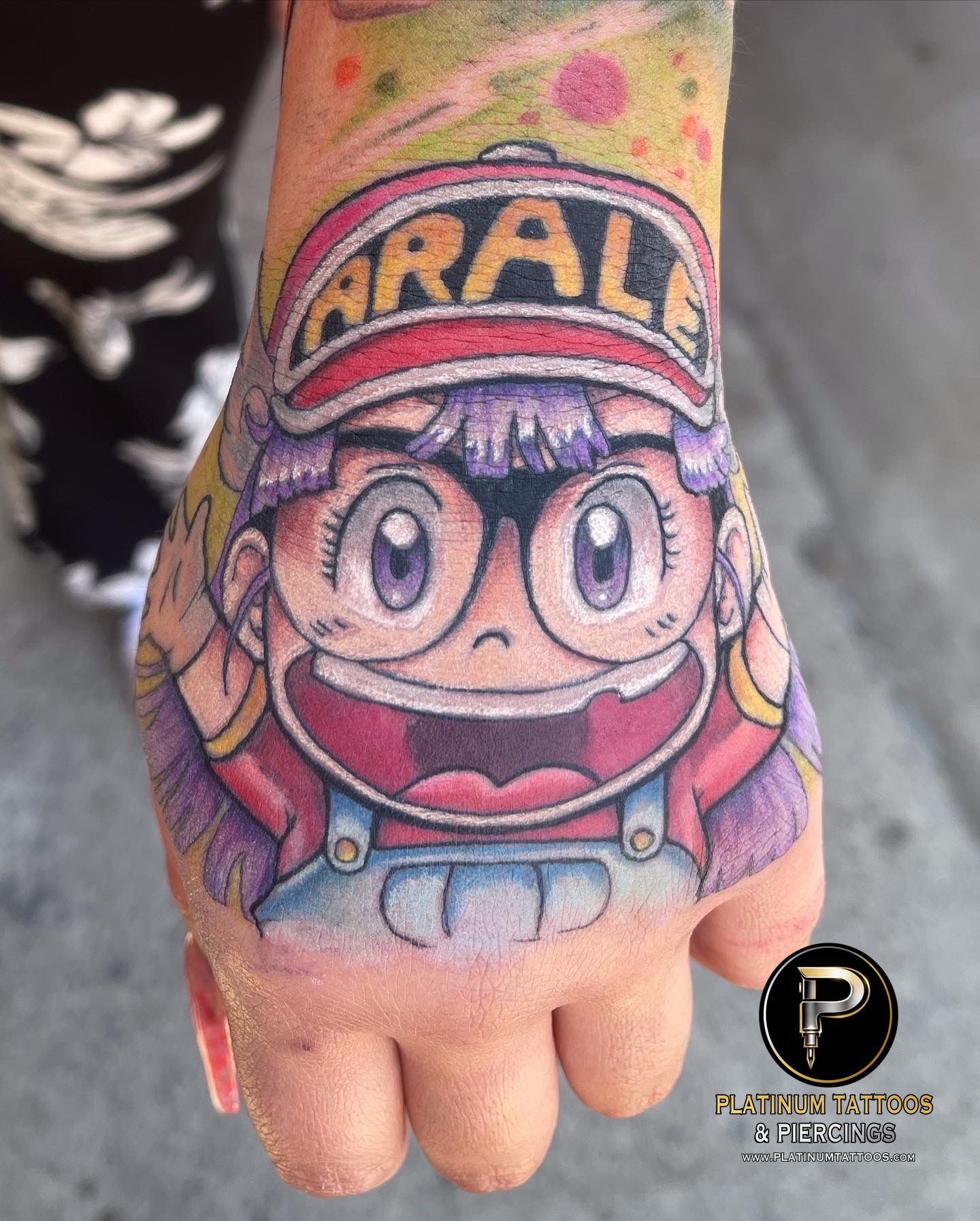 Anime tattoo on the hand by Jerson at Platinum Tattoos & Piercings, San Antonio TX