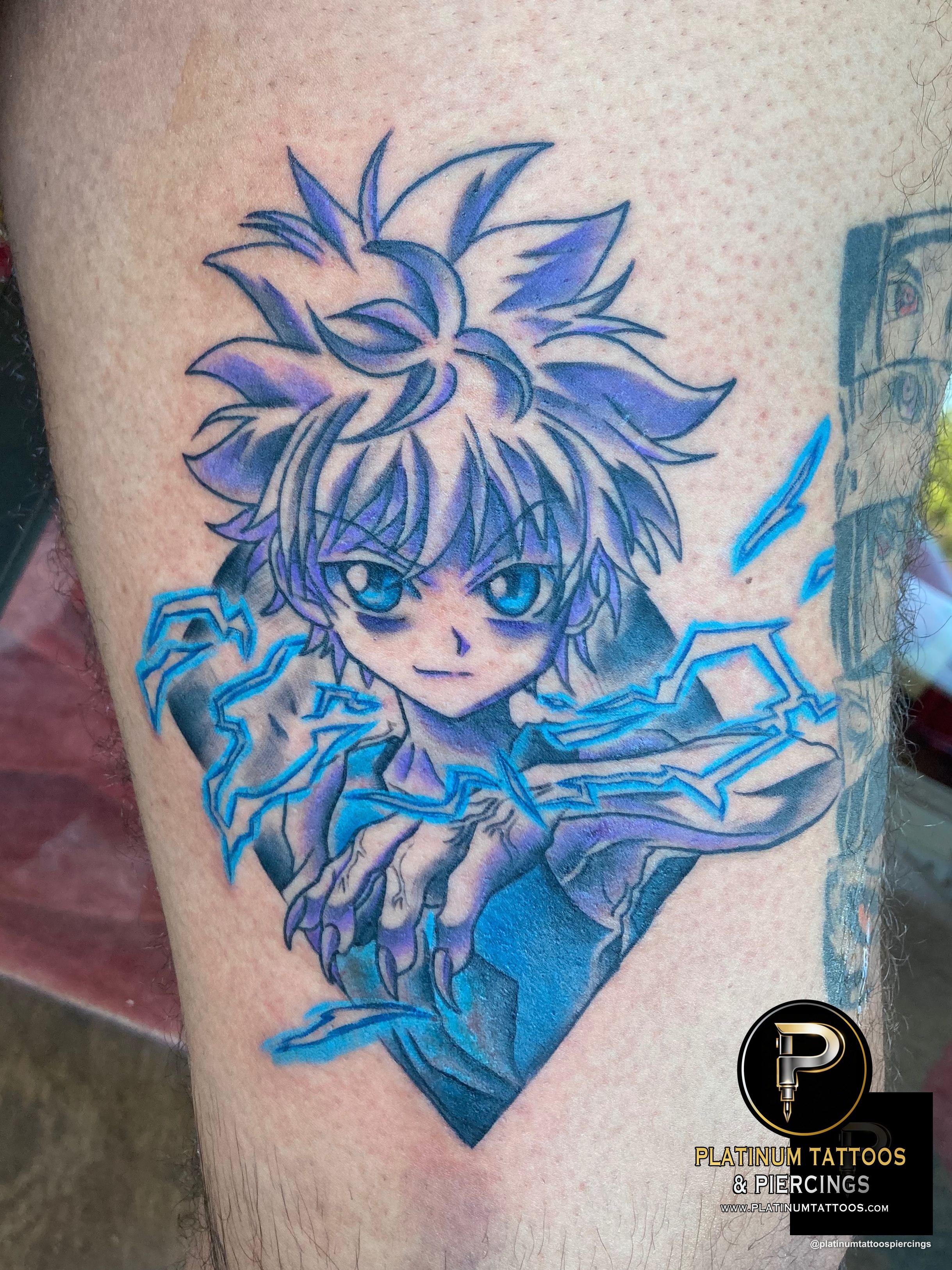 Anime tattoo on the forearm by JR at Platinum Tattoos & Piercings, San Antonio TX