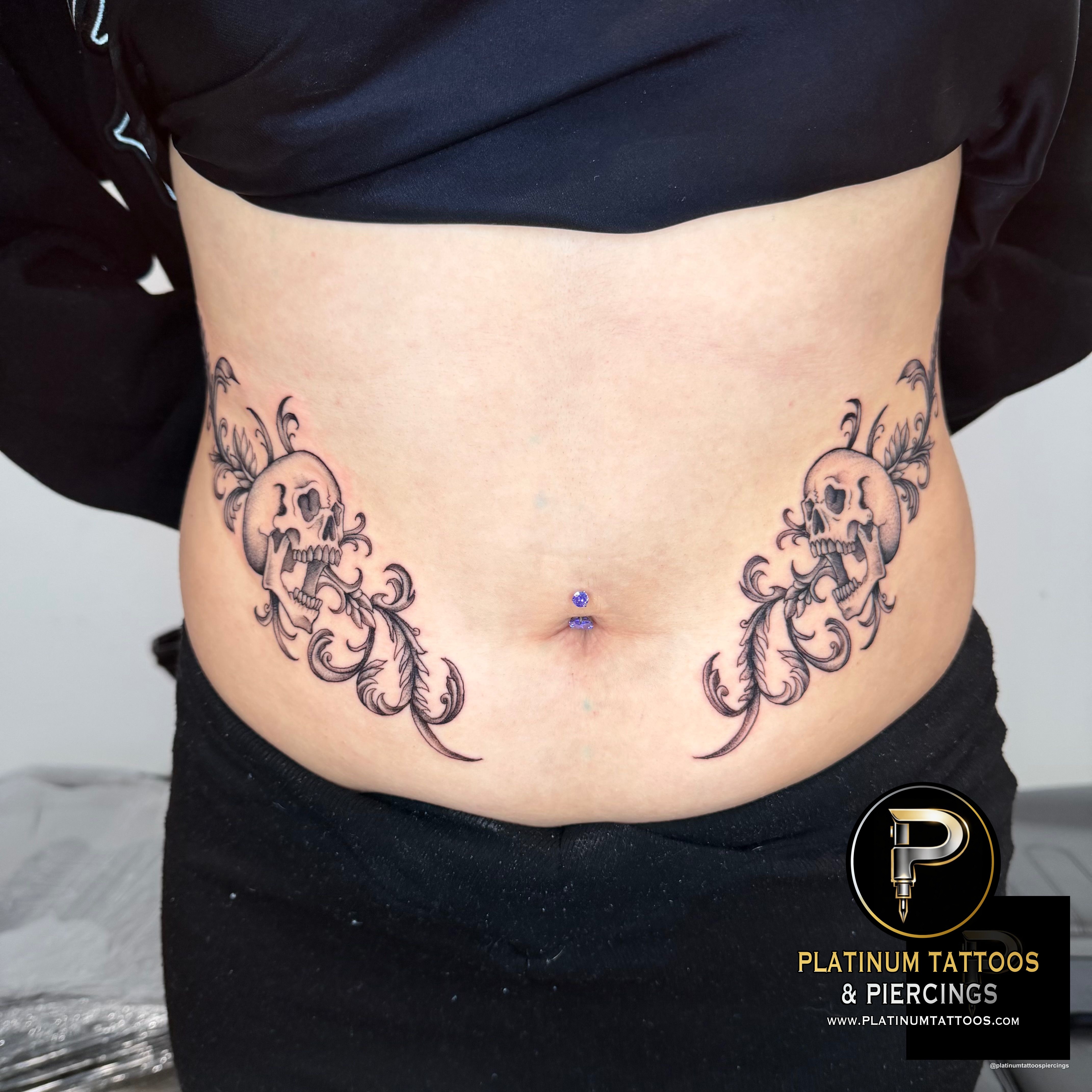 Blackwork tattoo on the stomach by Jerson at Platinum Tattoos & Piercings, San Antonio TX