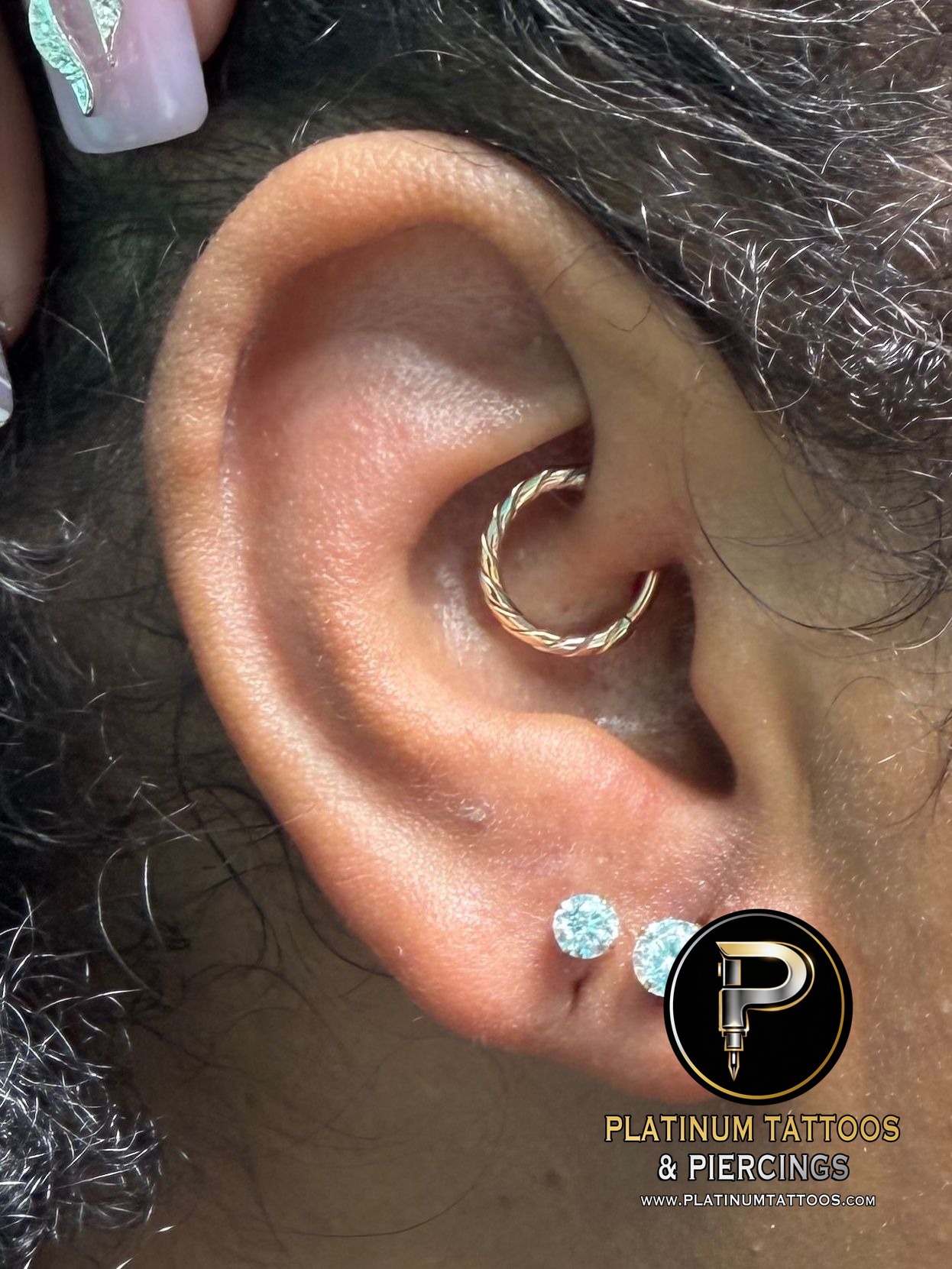 Curated ear piercing setup โ 1st Lobe, 2nd Lobe, Daith with Implant Grade Titanium, 14k Yellow Gold Threadless, Seamless Ring by NeoMetal, Other by Mingo at Platinum Tattoos & Piercings, San Antonio TX