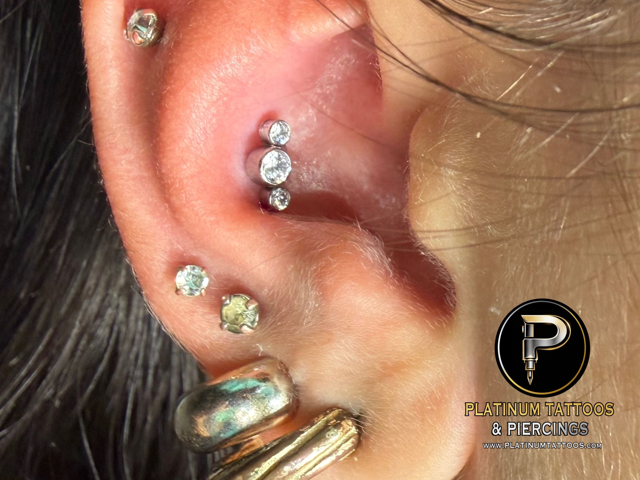 Conch piercing with Implant Grade Titanium Cluster/Multi-Gem by NeoMetal by Mingo at Platinum Tattoos & Piercings, San Antonio TX