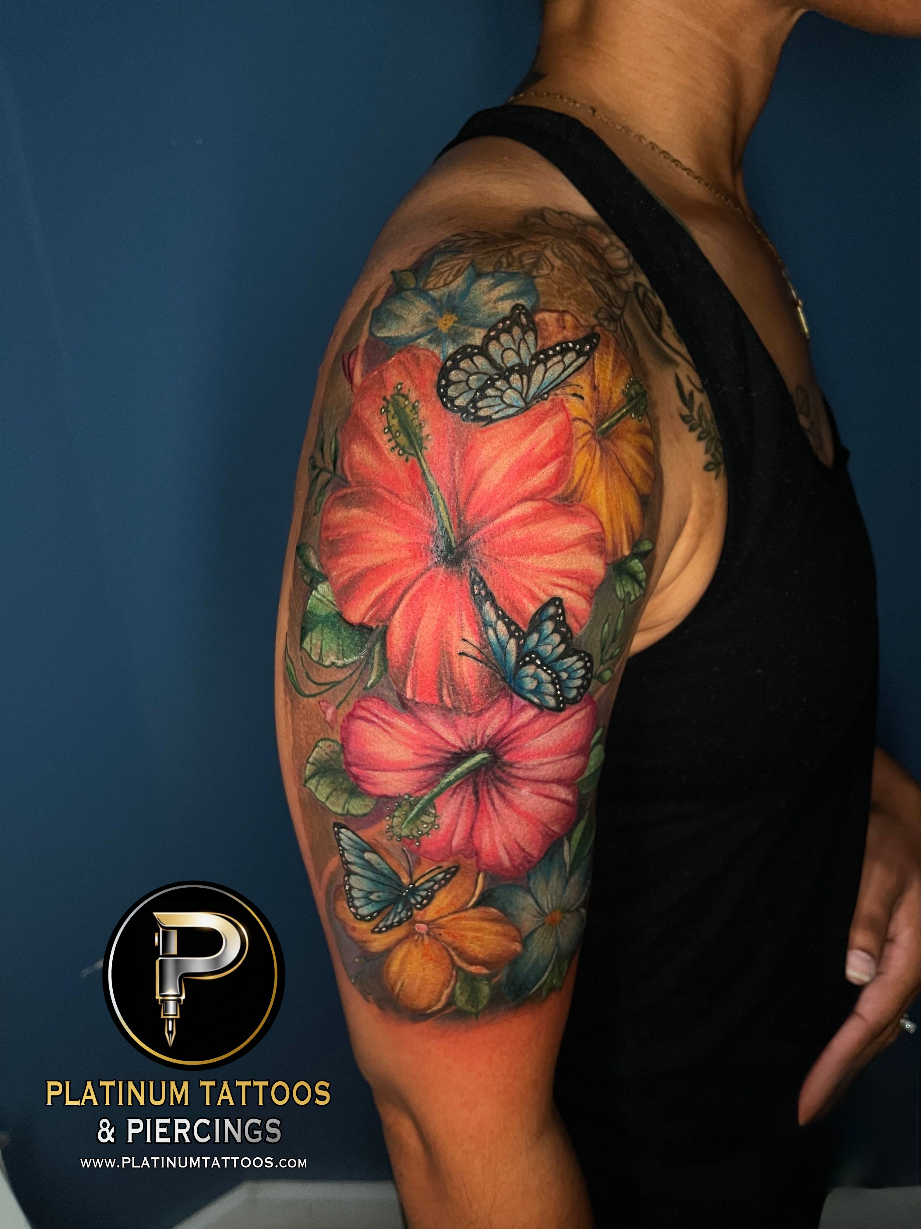 Floral tattoo by Jerson at Platinum Tattoos & Piercings, San Antonio TX