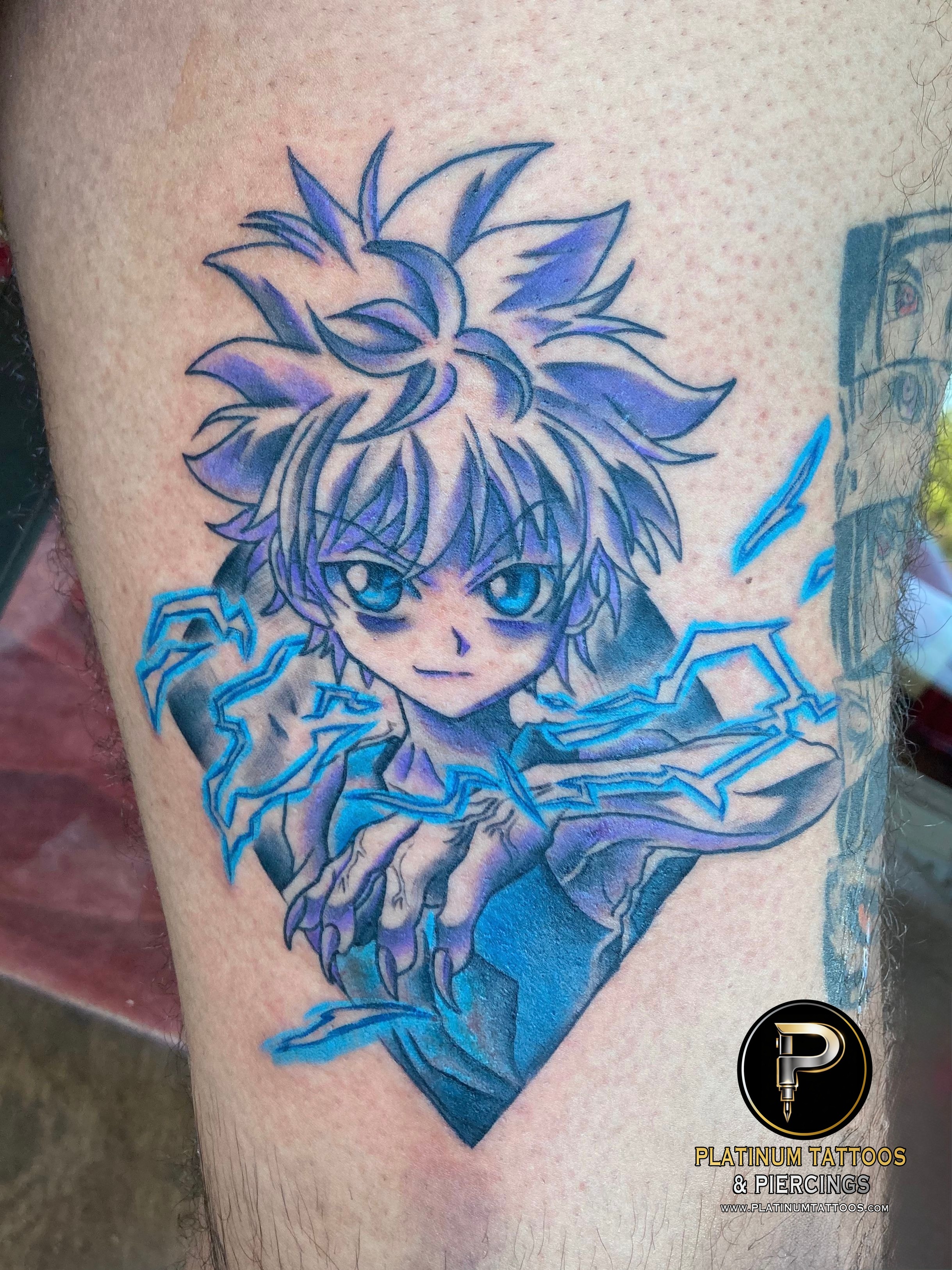 Anime tattoo on the forearm by JR at Platinum Tattoos & Piercings, San Antonio TX
