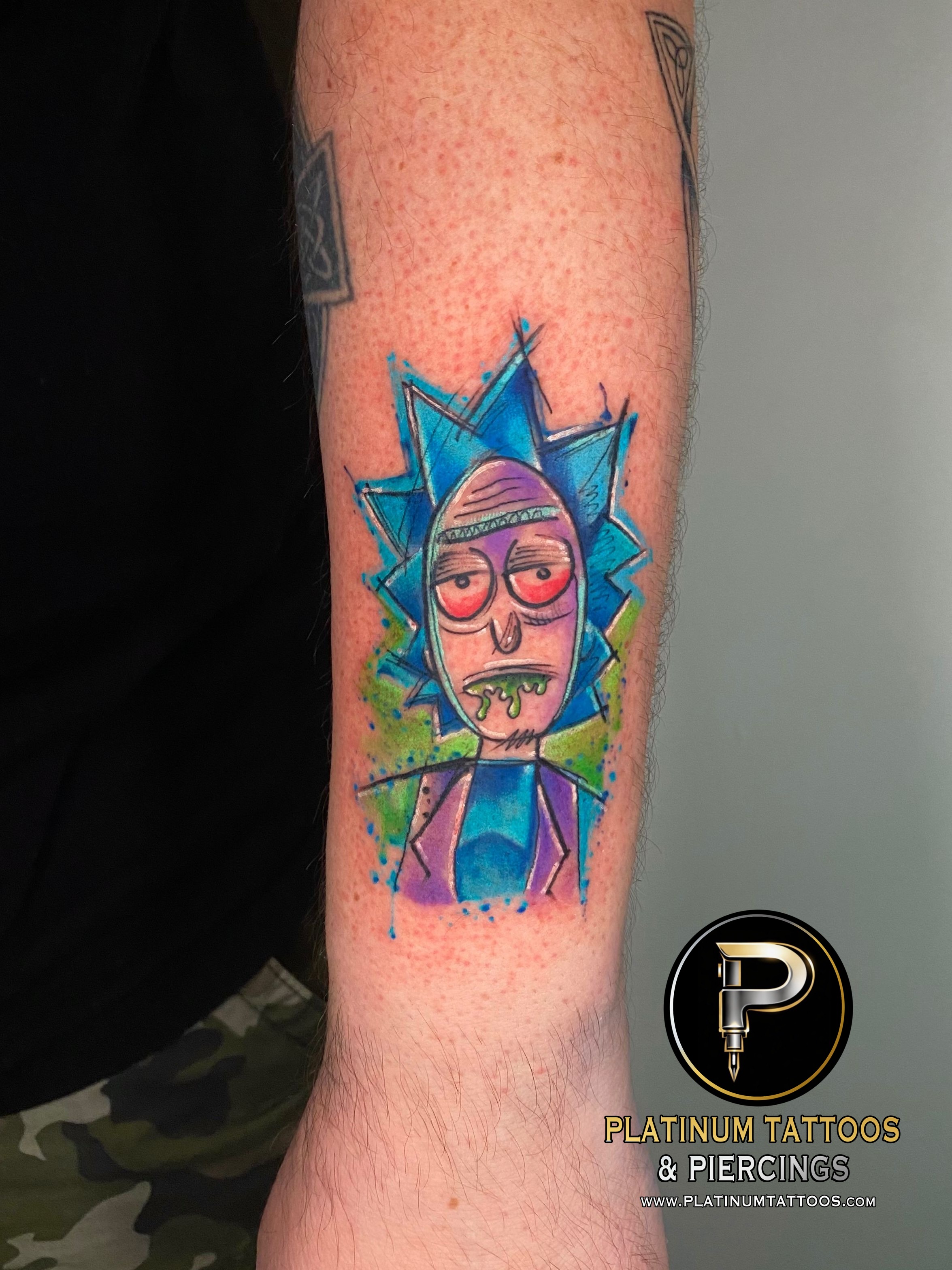 Anime tattoo on the forearm by Remy at Platinum Tattoos & Piercings, San Antonio TX