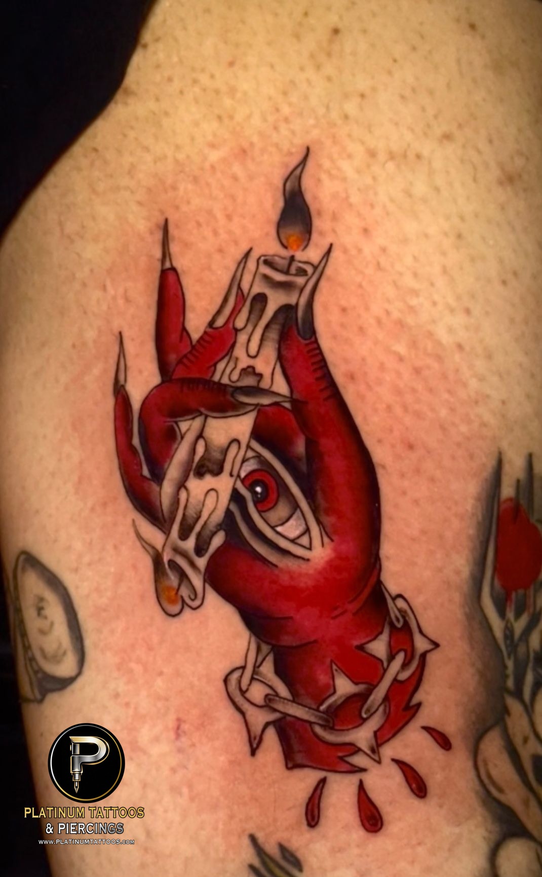 Traditional tattoo on the thigh by Skar at Platinum Tattoos & Piercings, San Antonio TX