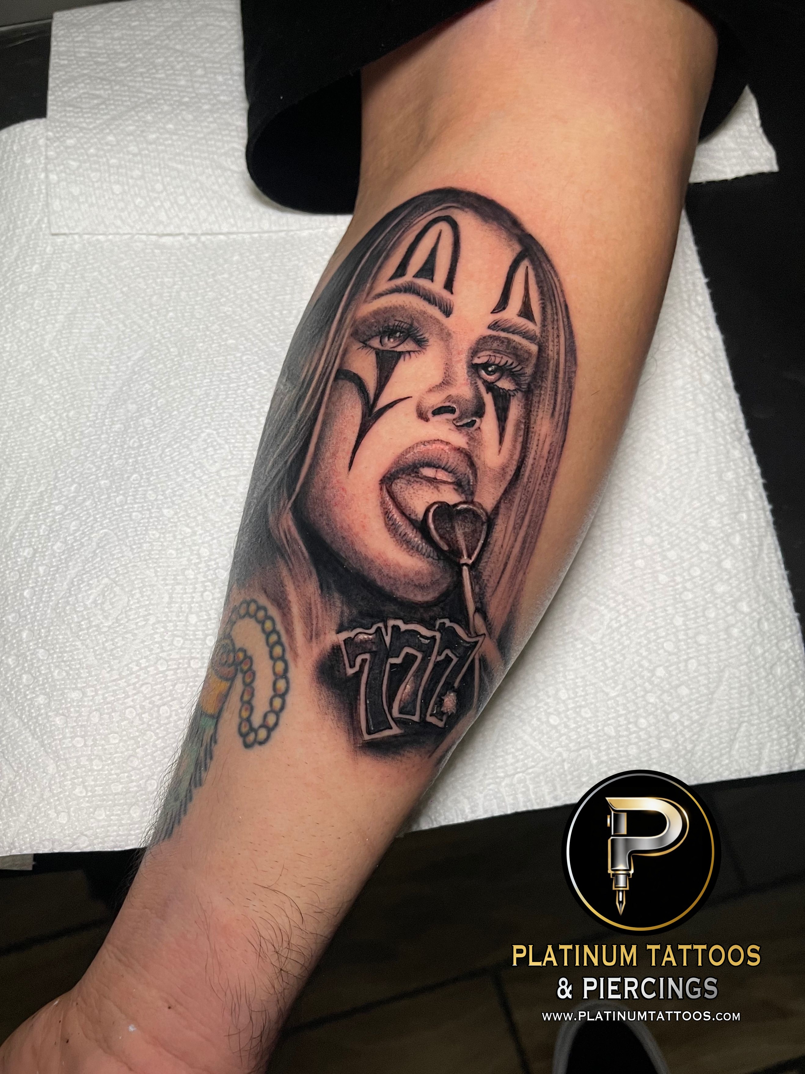 Tattoo on the forearm by Skar at Platinum Tattoos & Piercings, San Antonio TX