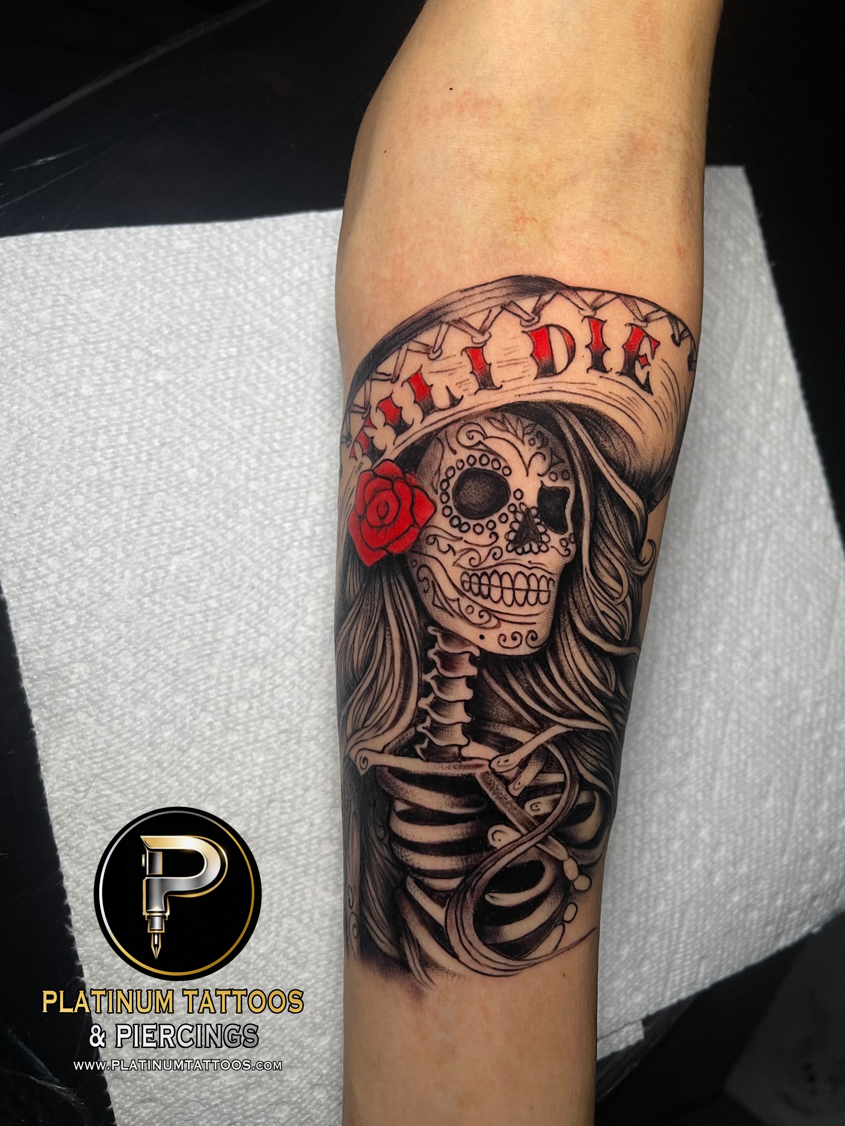 Tattoo on the forearm by Skar at Platinum Tattoos & Piercings, San Antonio TX