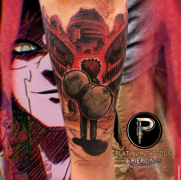 Anime tattoo on the calf at Platinum Tattoos & Piercings, San Antonio TX
