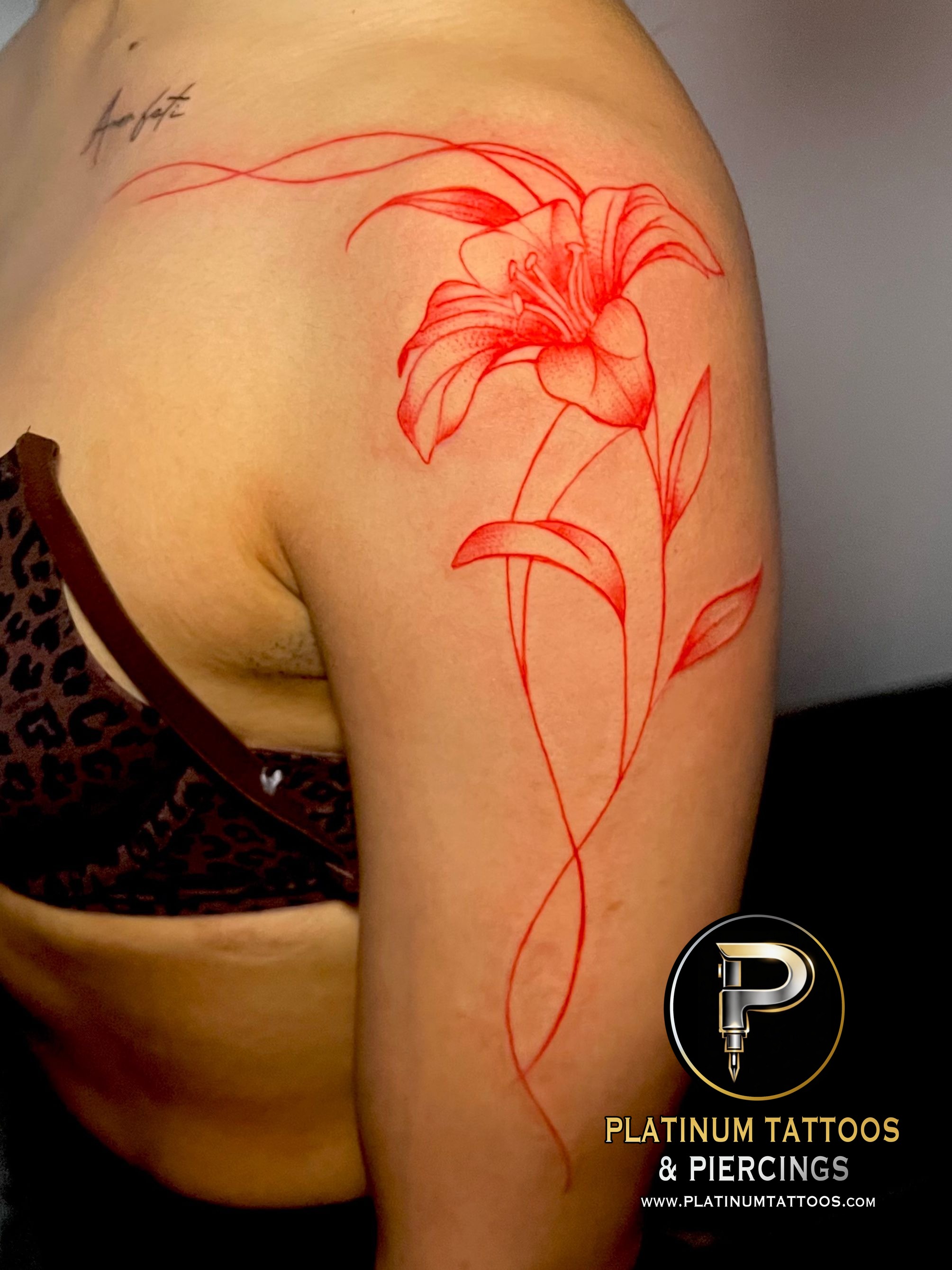 Floral tattoo by Skar at Platinum Tattoos & Piercings, San Antonio TX