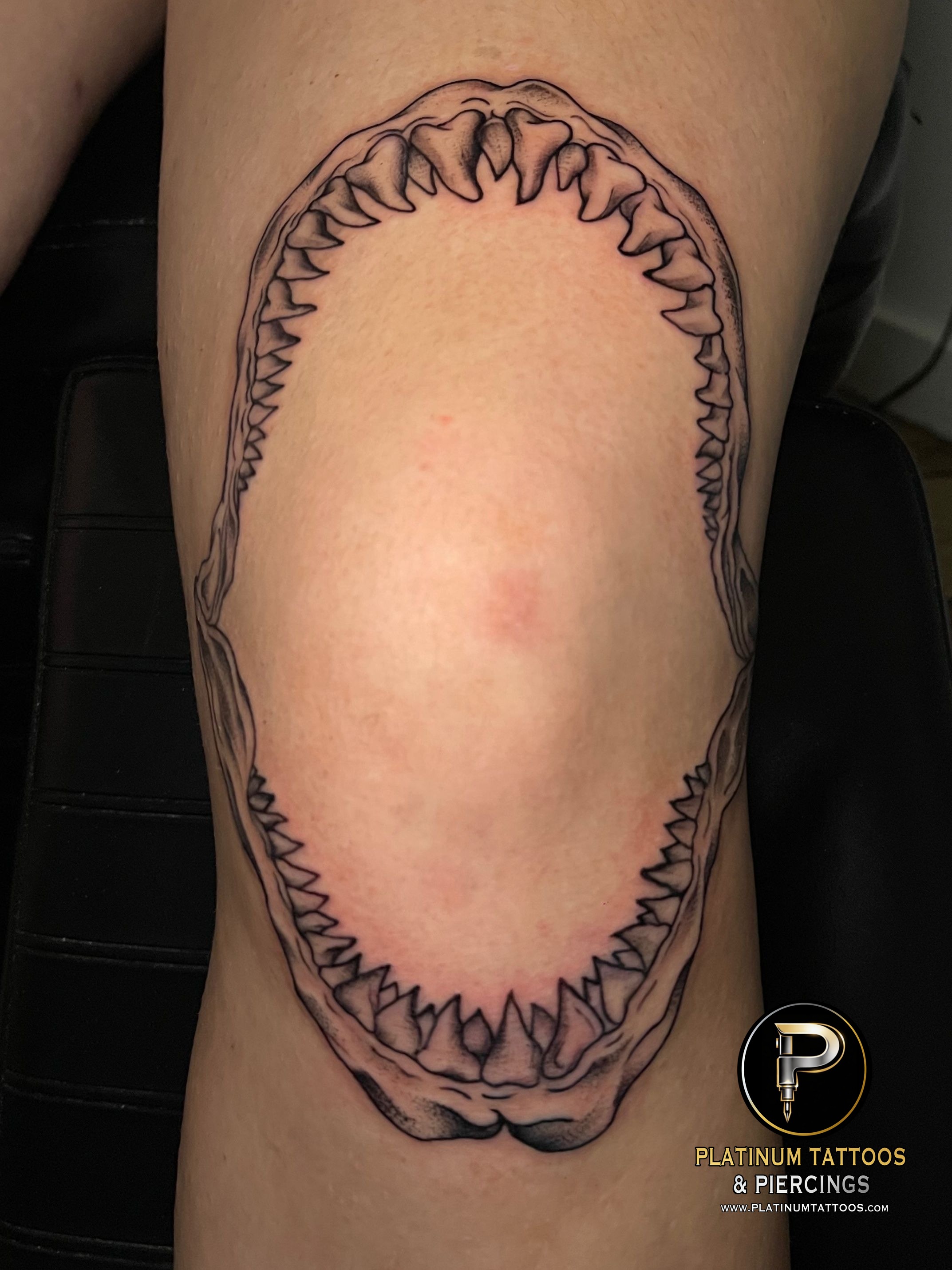 Tattoo on the knee by Skar at Platinum Tattoos & Piercings, San Antonio TX